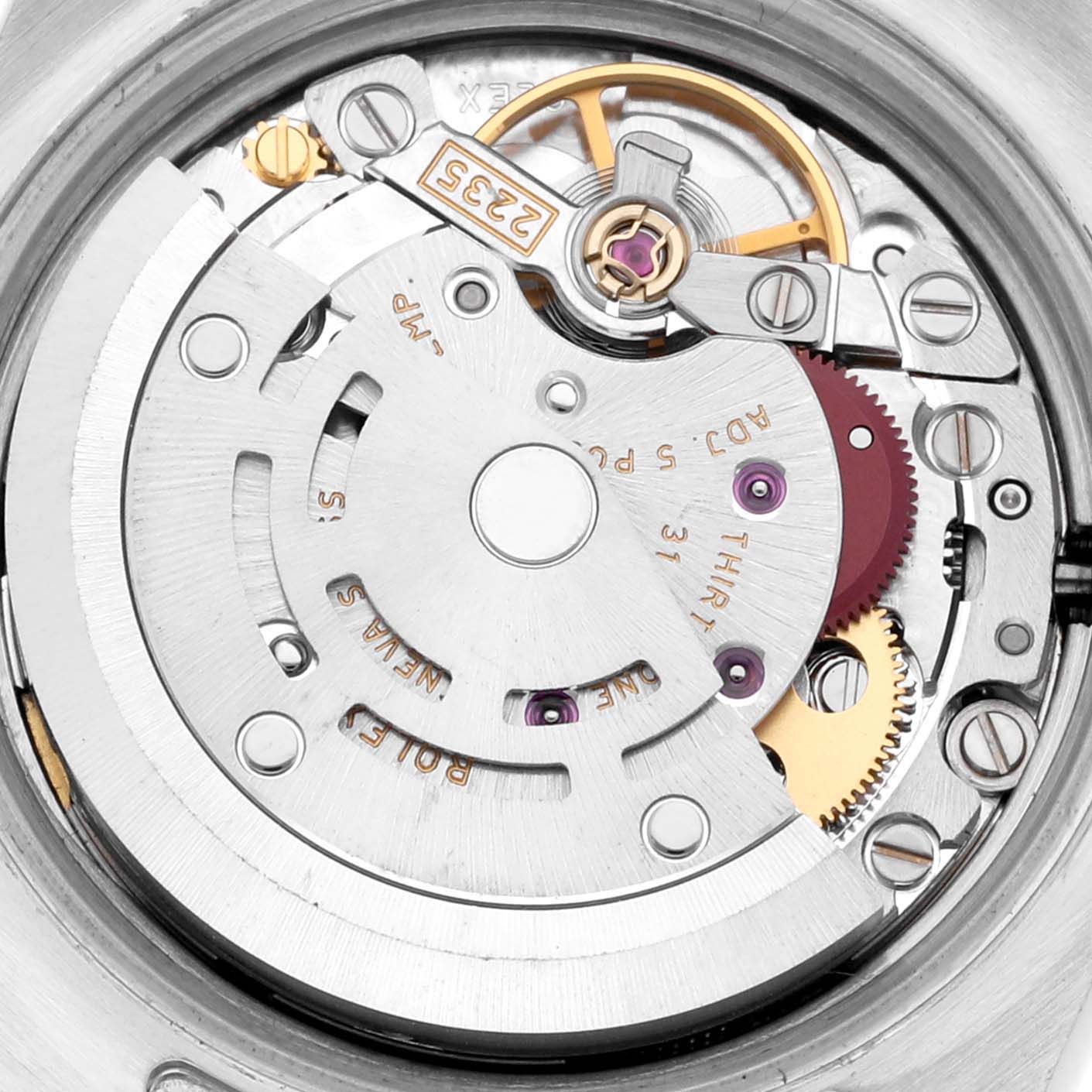 The image shows a close-up of the Rolex Datejust 179171 Women's Steel and Gold (two tone) Pink Dial 179171 Women's Steel and Gold (two tone) Pink Dial watch movement, highlighting its intricate internal mechanics.