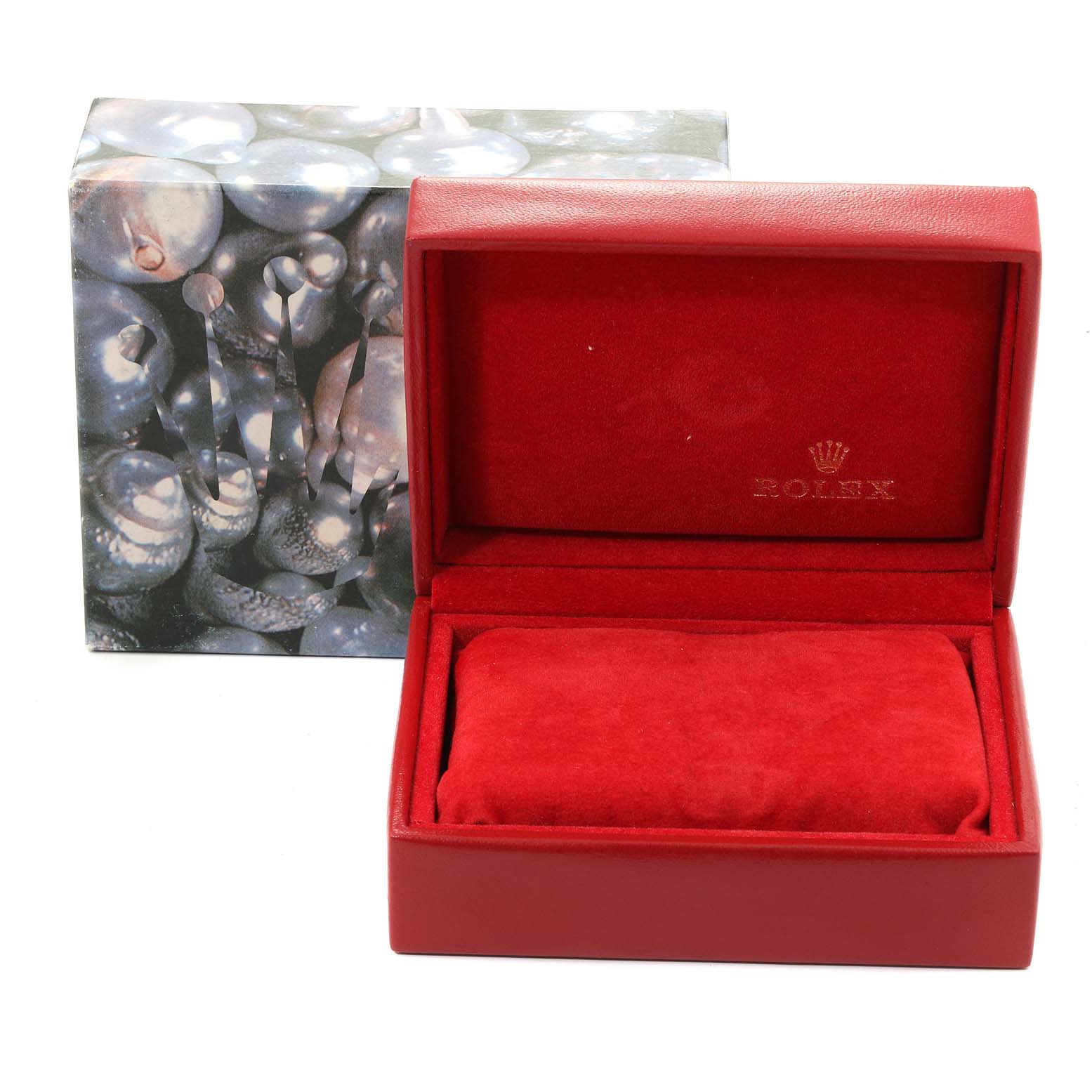 The image shows a red Rolex Datejust 79173 Women's Steel and Gold (two tone) Silver Dial 79173 Women's Steel and Gold (two tone) Silver Dial watch box and cushion, with the outer sleeve in the background.