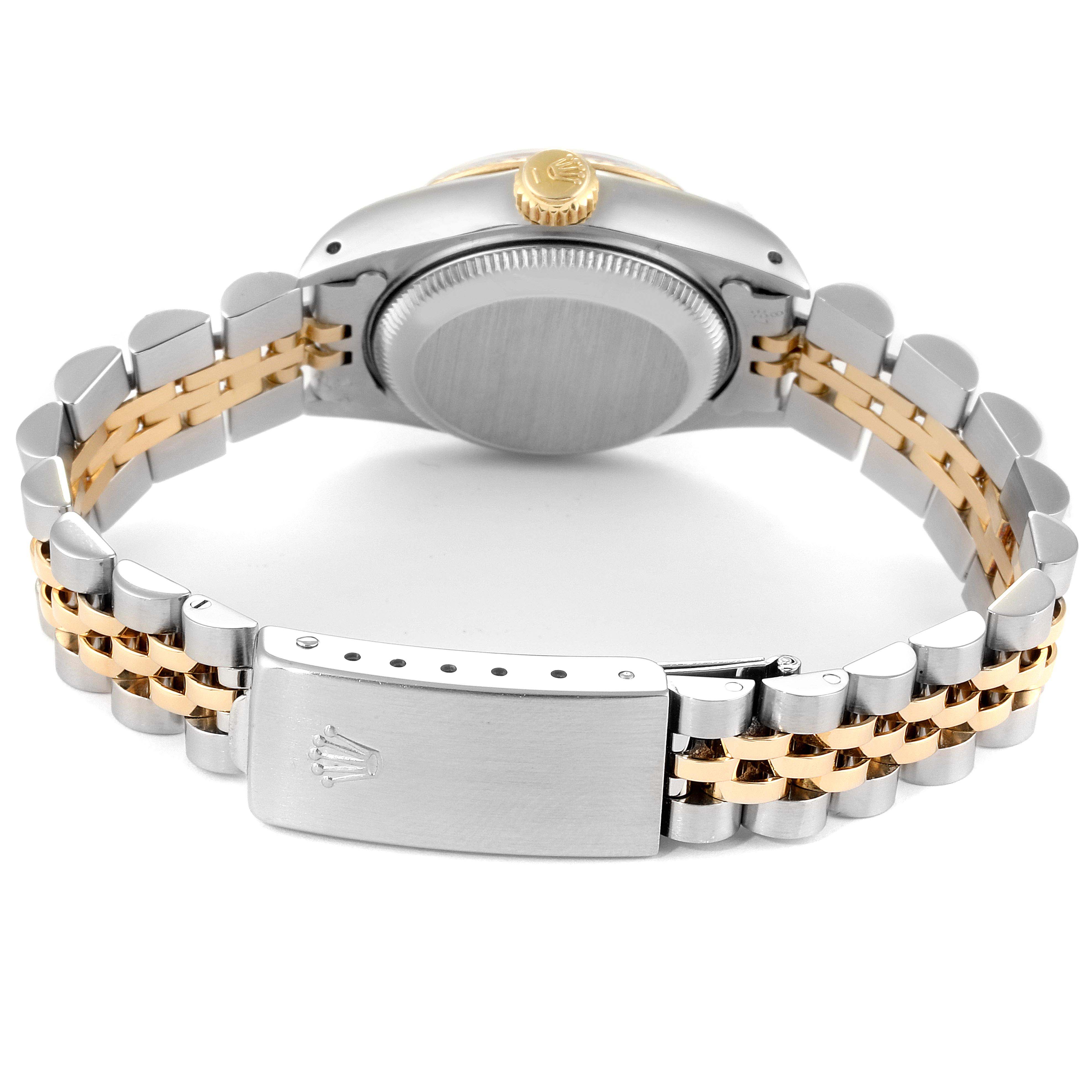 The image shows a rear view of a Rolex Datejust 69173 Women's Steel and Gold (two tone) Champagne Dial 69173 Women's Steel and Gold (two tone) Champagne Dial watch, highlighting its case back, crown, and two-tone bracelet.