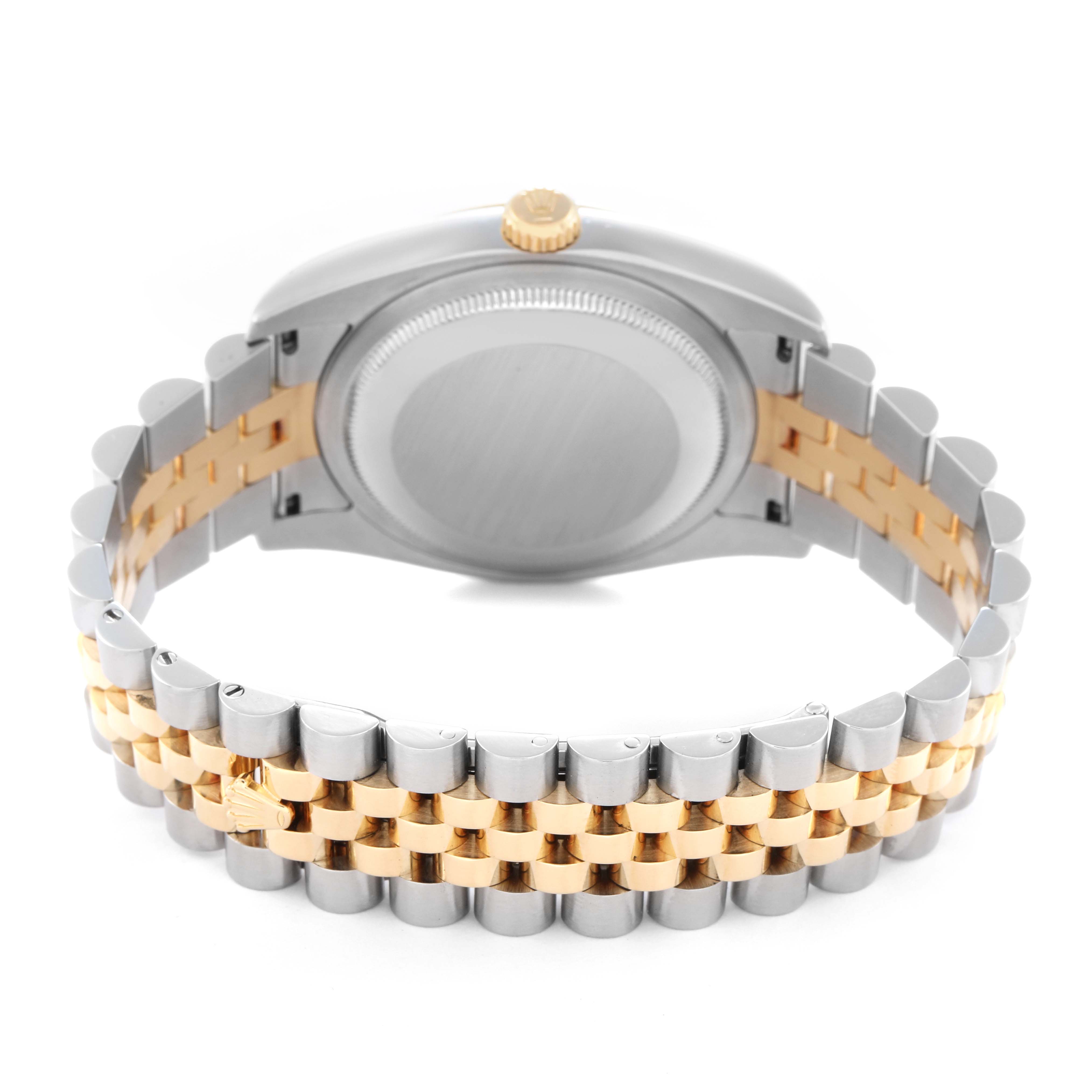The image shows a Rolex Datejust model 116233 from the back, highlighting the case back and two-tone metal bracelet.