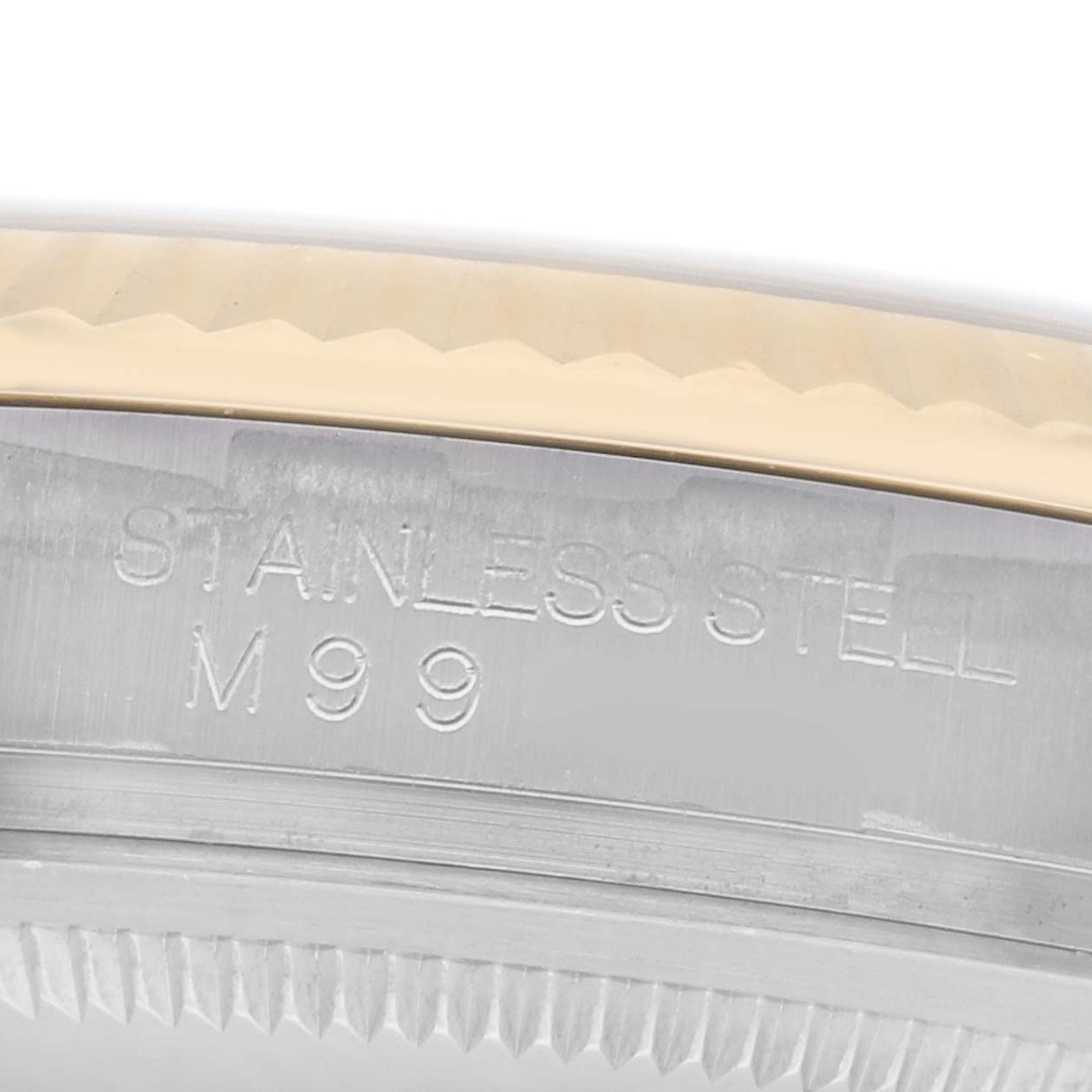 The image shows a close-up of the side case of a Rolex Datejust model 116233, highlighting the "STAINLESS STEEL" engraving on the edge.