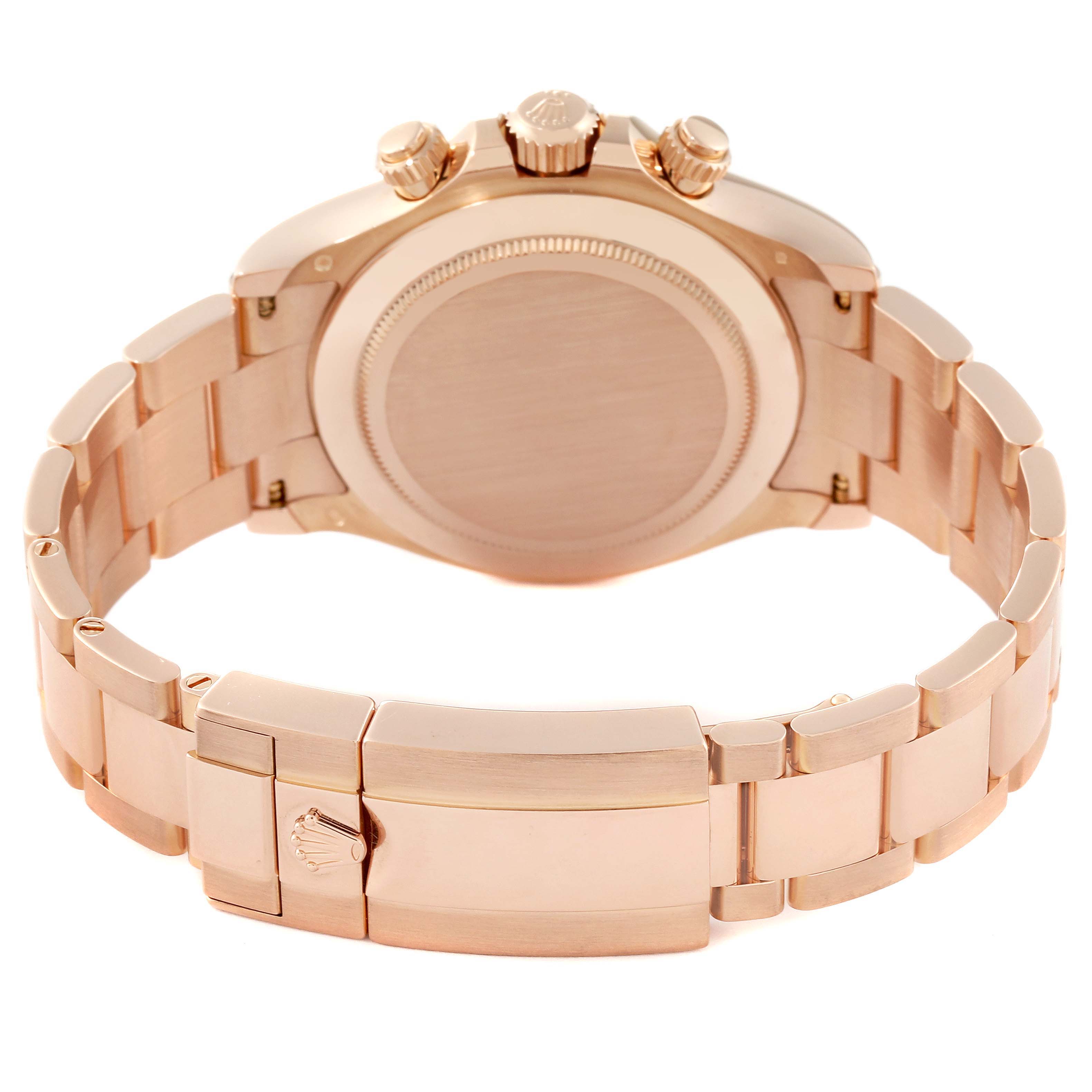 The image shows the back view and clasp of the Rolex Daytona 116505 Men's Rose Gold Brown Dial 116505 Men's Rose Gold Brown Dial watch, highlighting its case, bracelet, and crown.