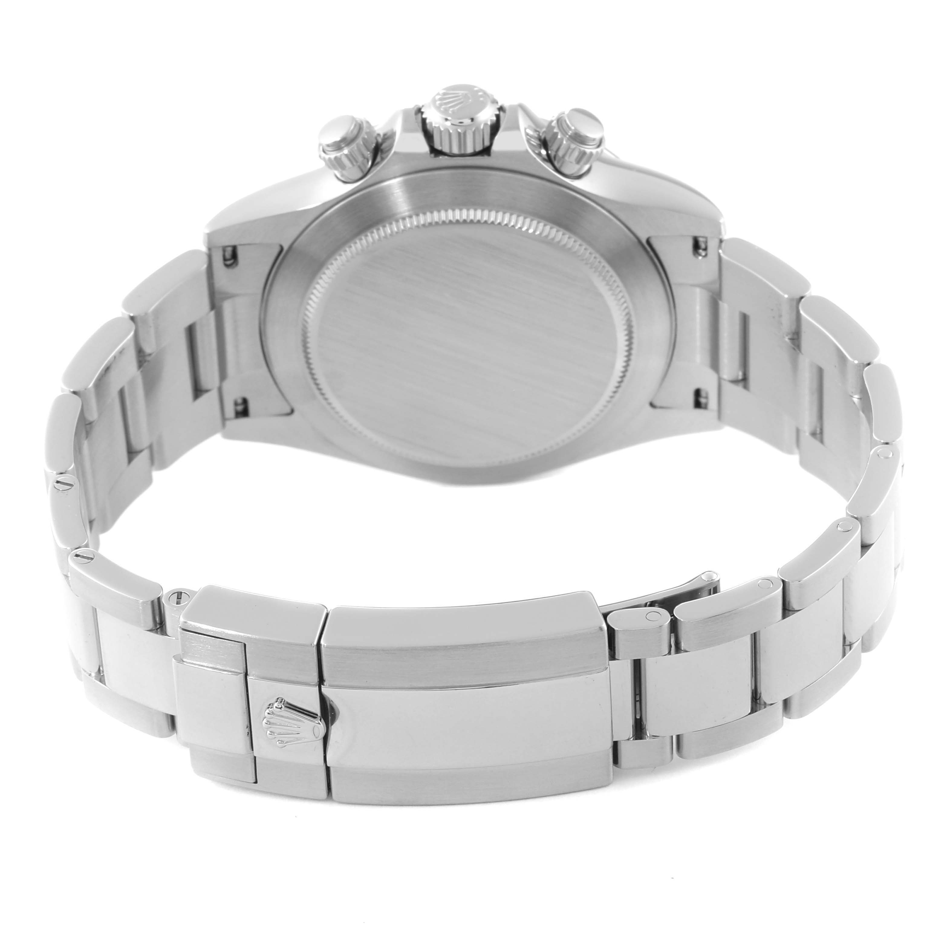 This image shows the backside of a Rolex Daytona 116520 Men's Stainless Steel Black Dial 116520 Men's Stainless Steel Black Dial watch, highlighting its clasp, bracelet, and case back.