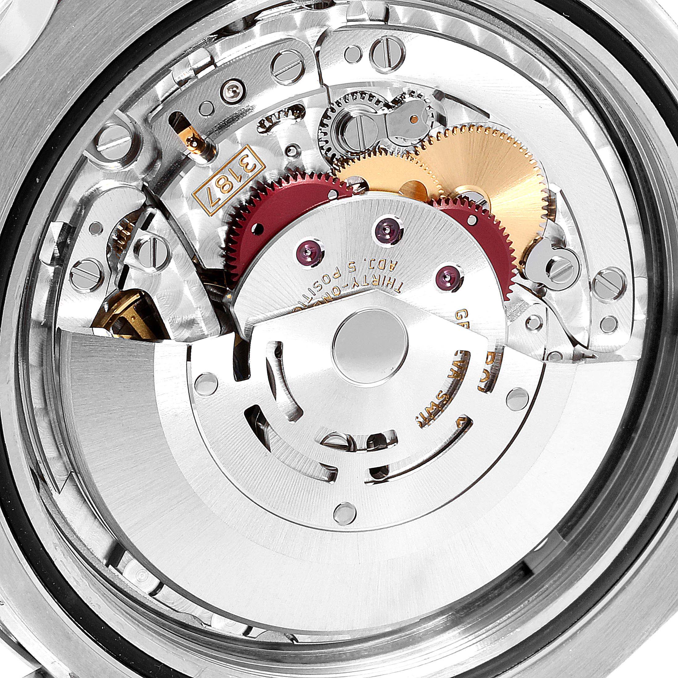 This image shows a close-up of the movement mechanism of a Rolex Explorer 216570 Men
s Stainless Steel Black Dial 216570 Men
s Stainless Steel Black Dial watch.