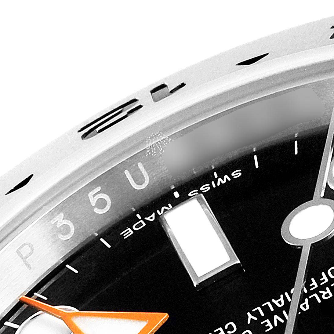 The image shows a close-up of the dial and part of the bezel of a Rolex Explorer 216570 Men
s Stainless Steel Black Dial 216570 Men
s Stainless Steel Black Dial watch.