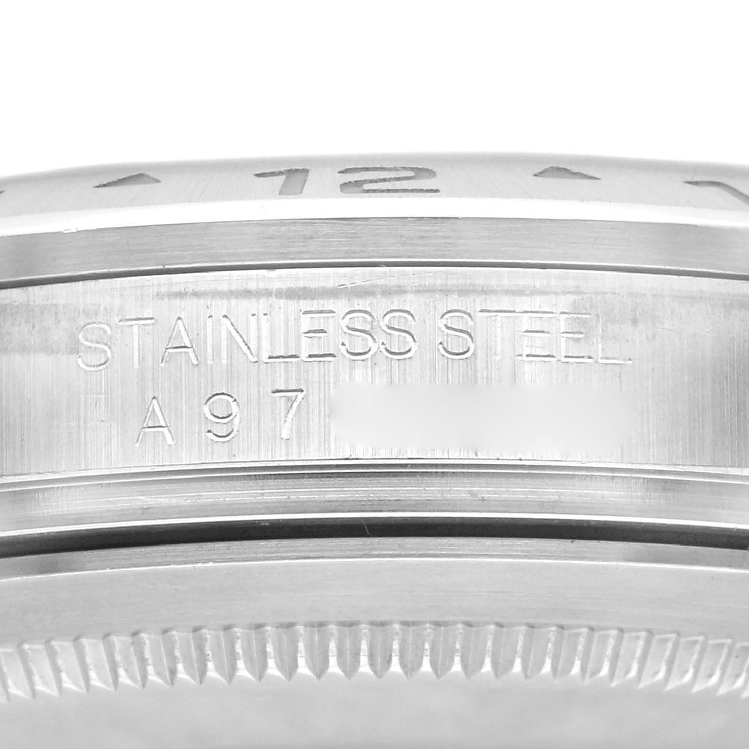 The close-up image shows the inscription on the stainless steel case side of a Rolex Explorer 16570 Men
s Stainless Steel Black Dial 16570 Men
s Stainless Steel Black Dial watch.