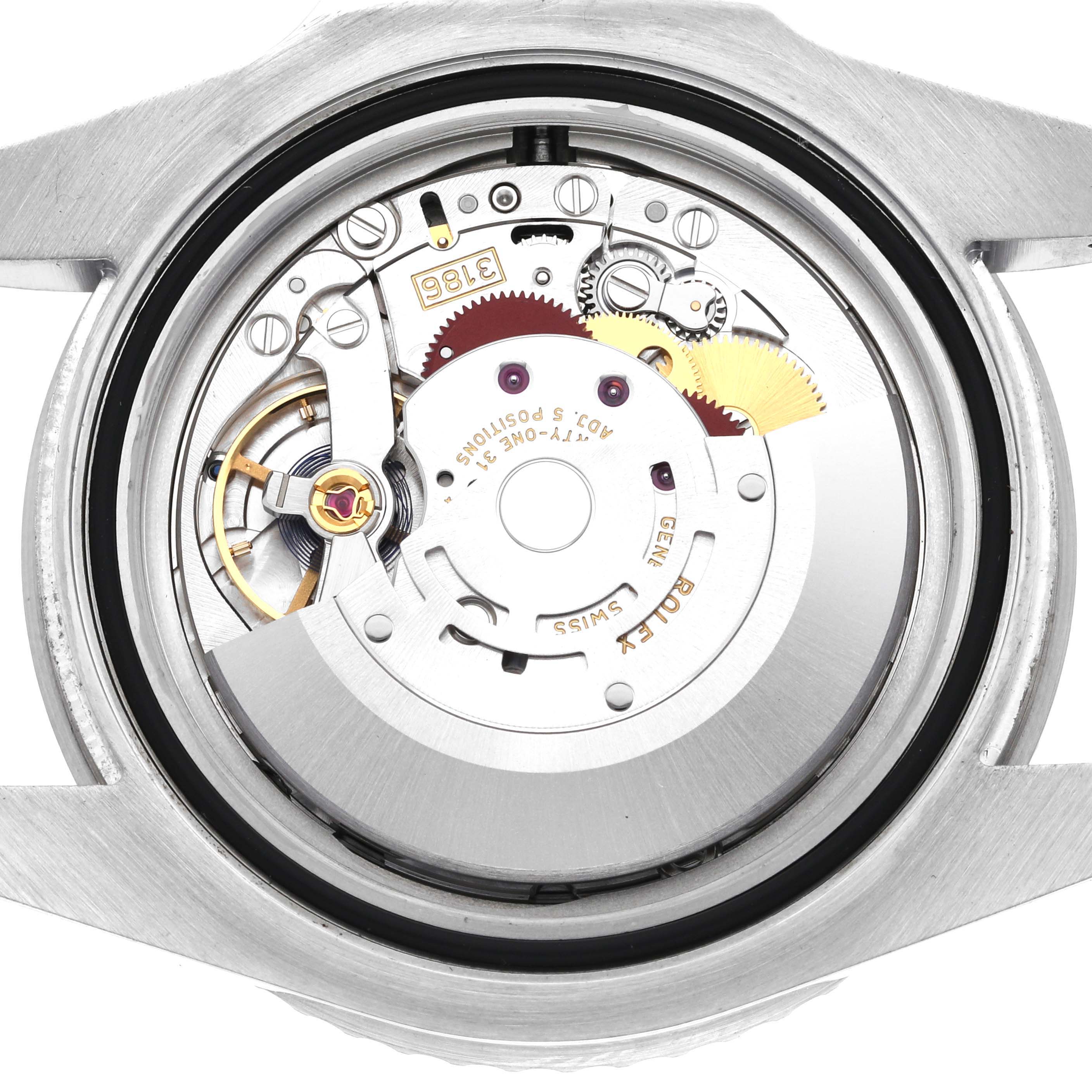 This image shows the open case back of a Rolex GMT-Master 116710BLNR Men
s Stainless Steel Black Dial 116710BLNR Men
s Stainless Steel Black Dial watch, highlighting its intricate movement and mechanism.