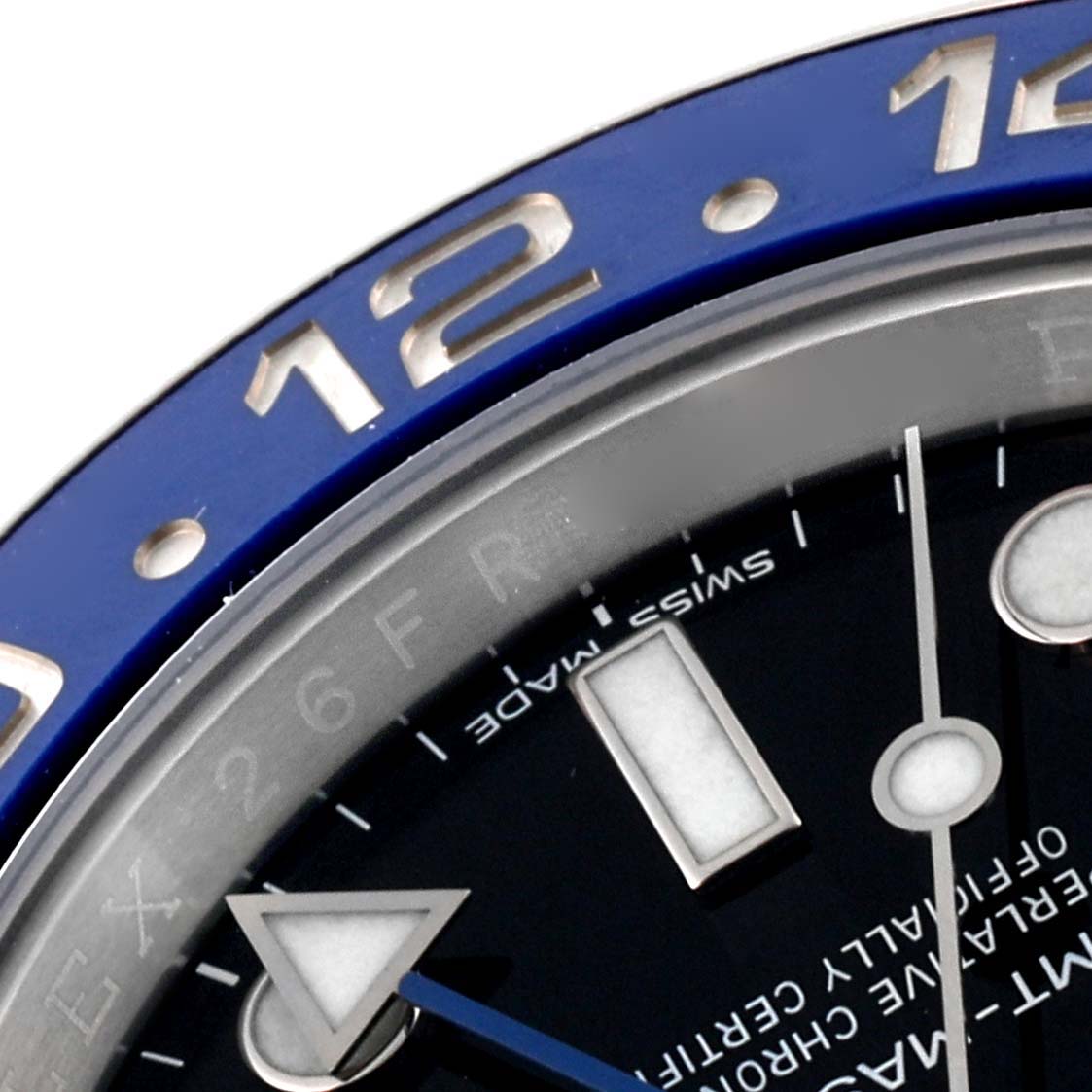 This image shows a close-up of the bezel and dial of a Rolex GMT-Master 116710BLNR Men
s Stainless Steel Black Dial 116710BLNR Men
s Stainless Steel Black Dial watch, highlighting the hour markers and part of the hands.
