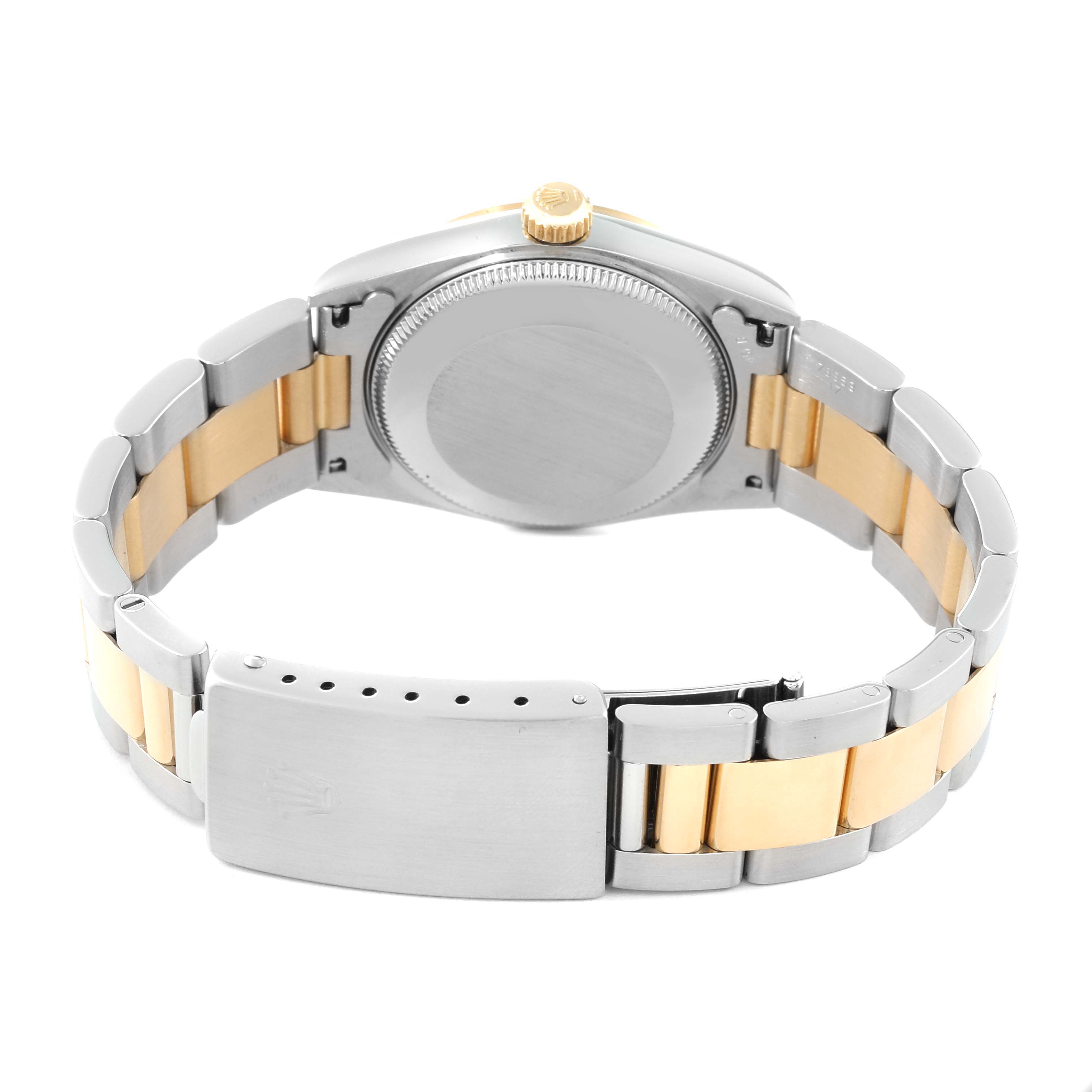 The image shows the back of a Rolex Mid-Size 67483 Women's Steel and Gold (two tone) Champagne Dial 67483 Women's Steel and Gold (two tone) Champagne Dial model watch, including the clasp and bracelet.