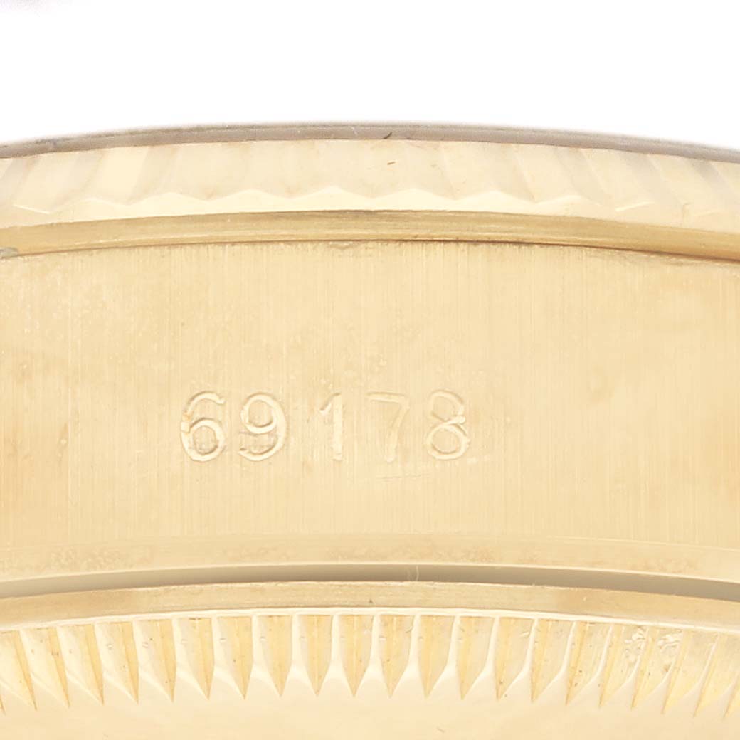 This image shows a close-up angle of the side of the Rolex President 69178 Women's Yellow Gold Champagne Dial 69178 Women's Yellow Gold Champagne Dial model watch, displaying the model number 69178.