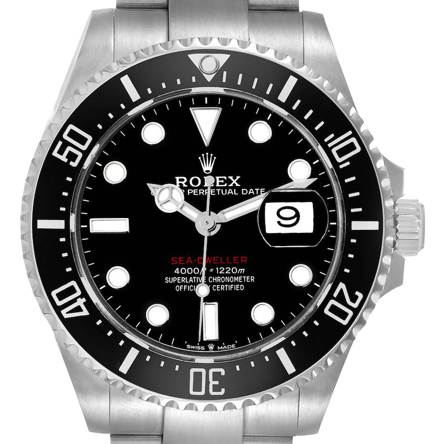 The Rolex Sea-Dweller model 126600 is shown from a front angle, highlighting the dial, bezel, and part of the bracelet.