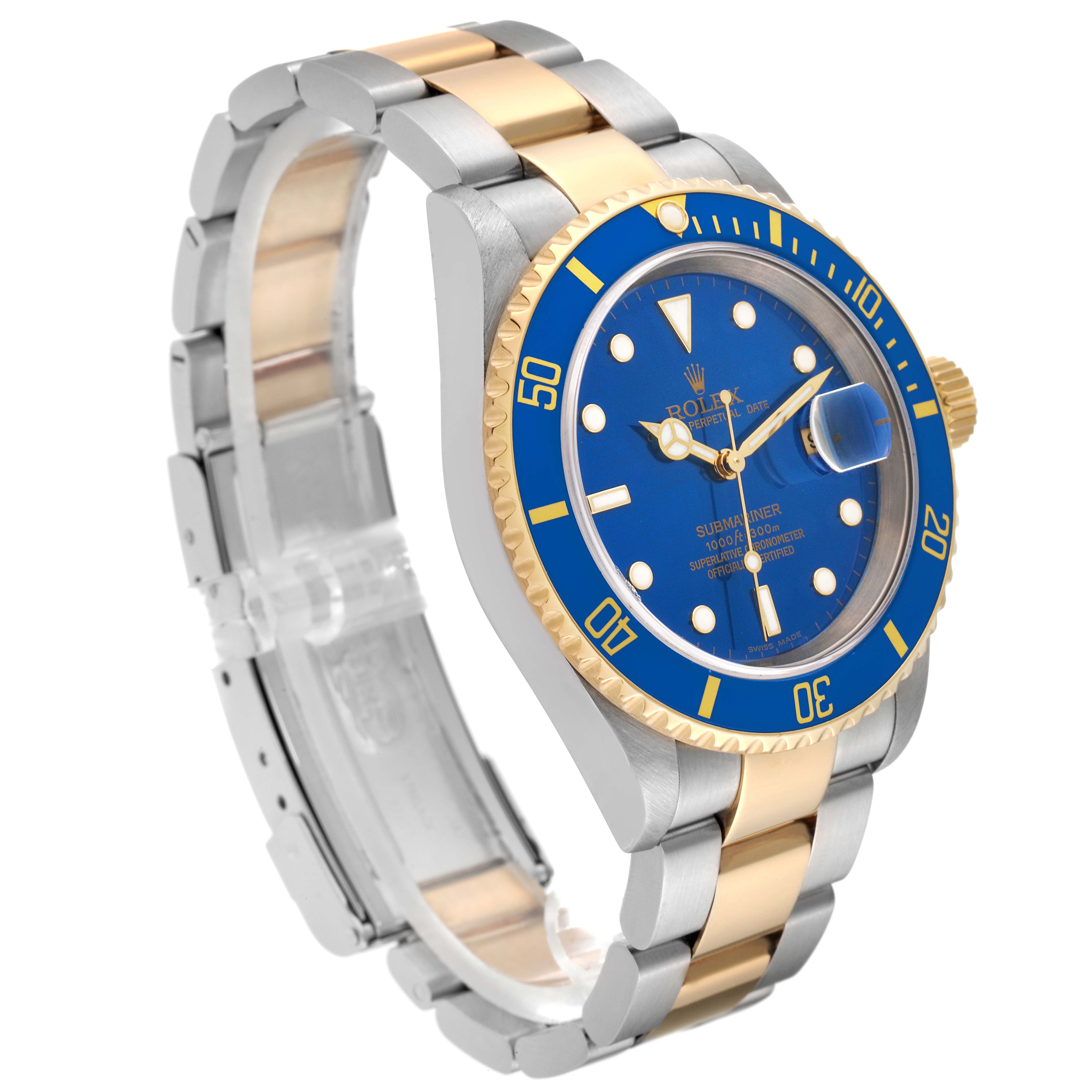 This image shows a Rolex Submariner 16613 Men's Steel and Gold (two tone) Blue Dial 16613 Men's Steel and Gold (two tone) Blue Dial watch at an angled side view, highlighting its blue dial, bezel, and two-tone band.