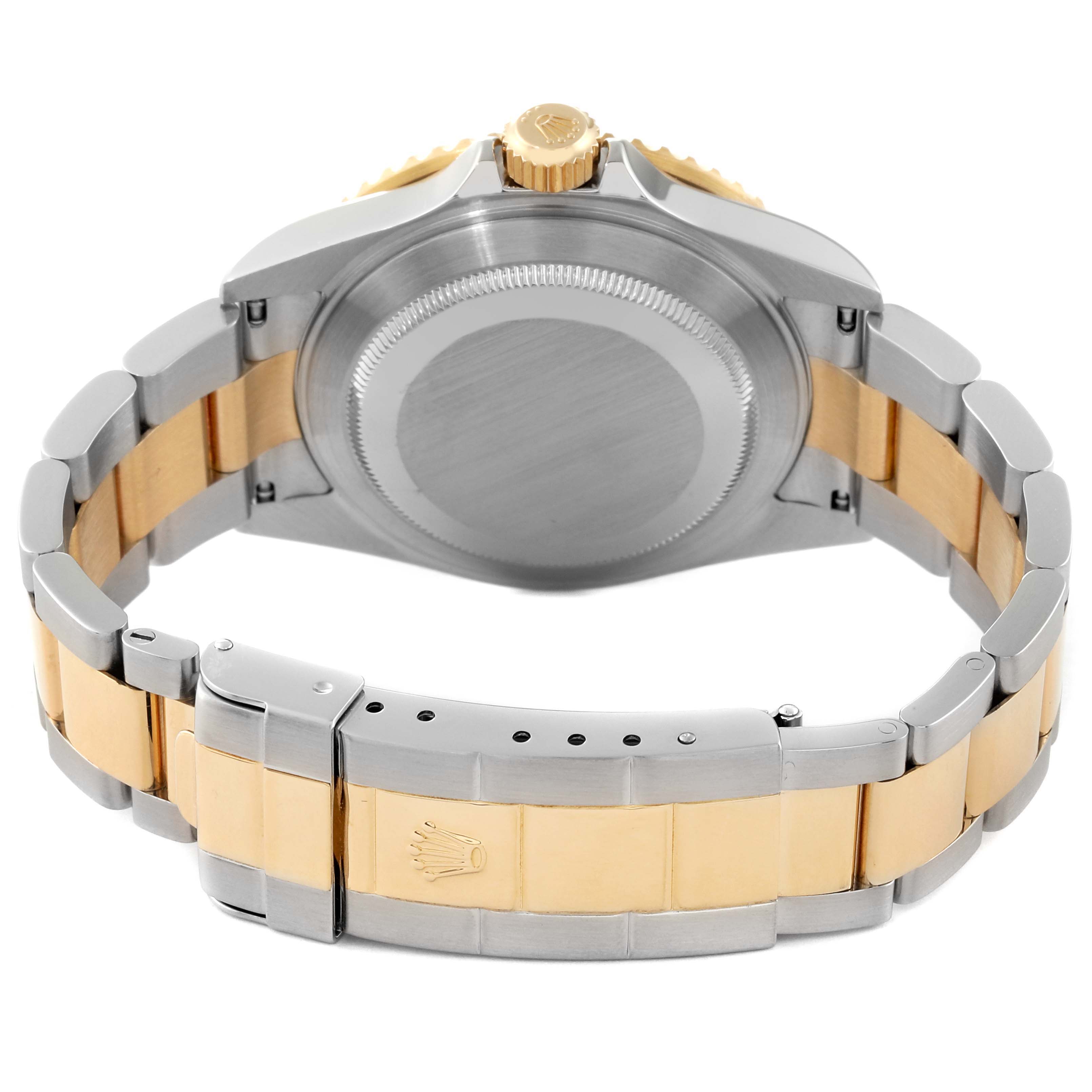 The image shows the back side, bracelet, and clasp of a Rolex Submariner 16613 Men's Steel and Gold (two tone) Blue Dial 16613 Men's Steel and Gold (two tone) Blue Dial watch.