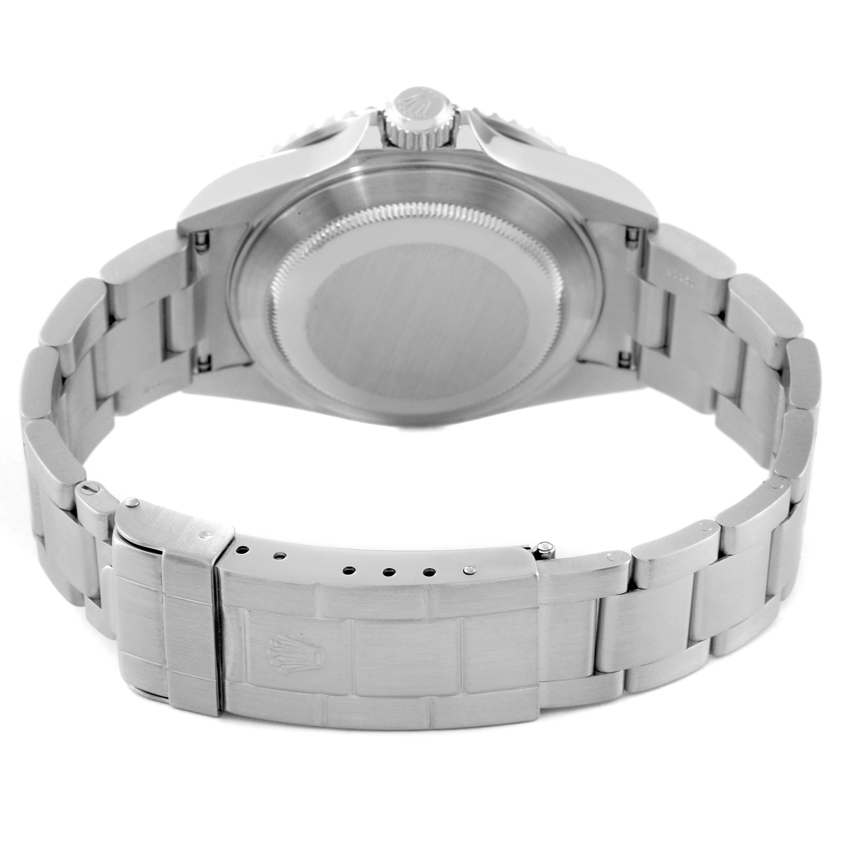 The image shows the backside of a Rolex Submariner 16610 Men
s Stainless Steel Black Dial 16610 Men
s Stainless Steel Black Dial watch, highlighting the bracelet, clasp, and case back.