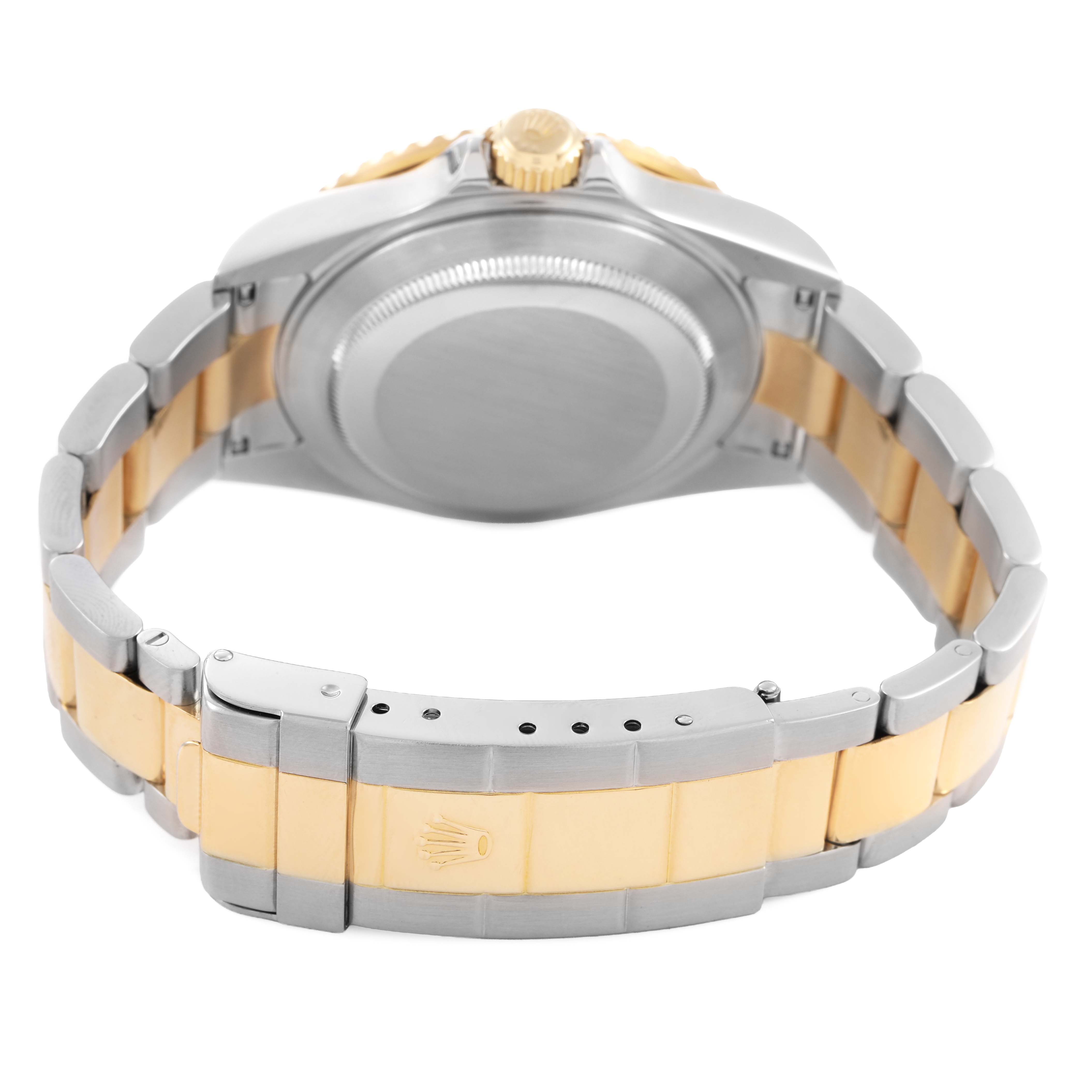 The image shows the back angle of a Rolex Submariner 16613 Men's Steel and Gold (two tone) Blue Dial, highlighting the two-tone bracelet and clasp.