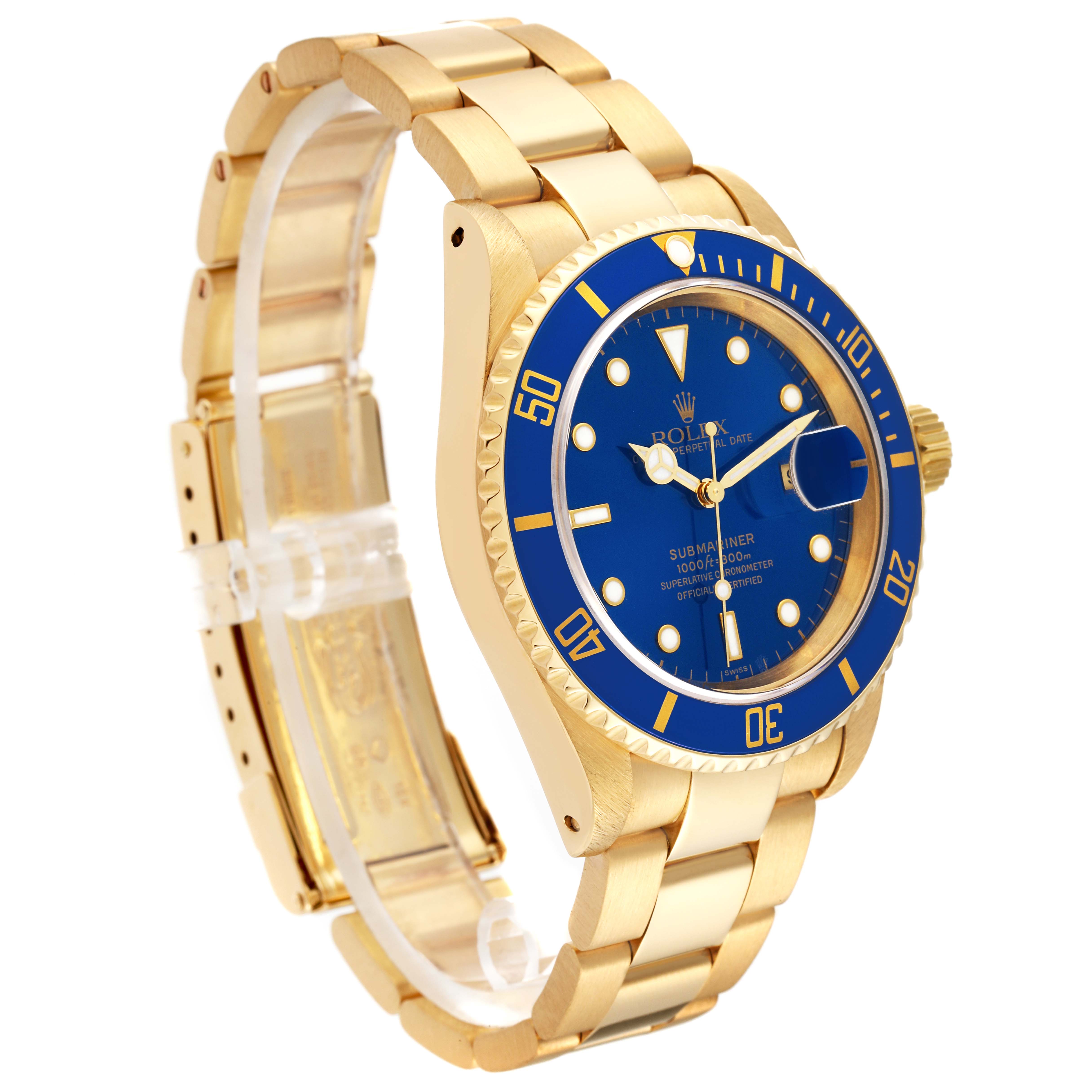 This image shows a gold Rolex Submariner 16618 Men's Yellow Gold Blue Dial 16618 Men's Yellow Gold Blue Dial watch with a blue dial and bezel, captured from a side angle.