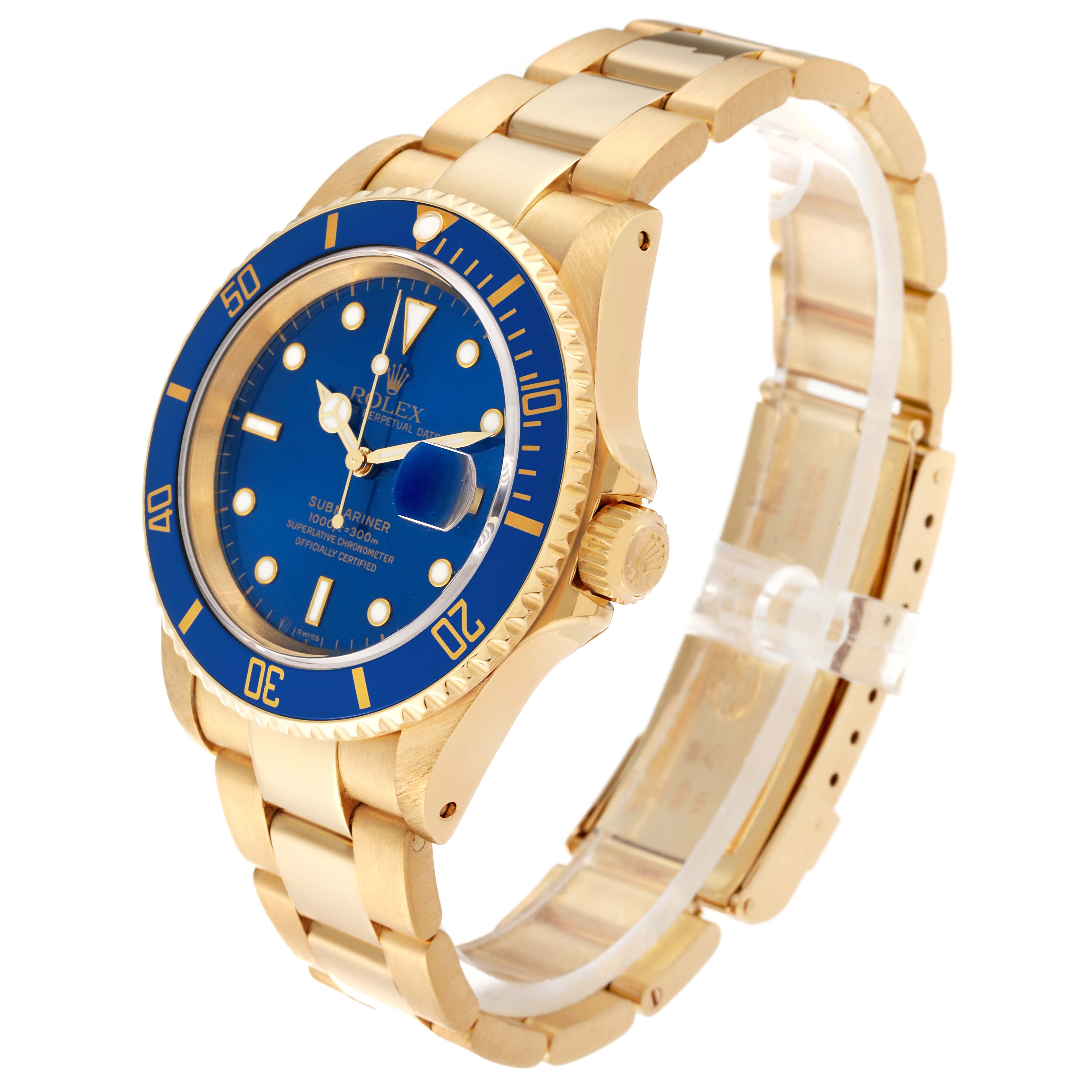 This image shows the Rolex Submariner 16618 Men's Yellow Gold Blue Dial 16618 Men's Yellow Gold Blue Dial watch at an angle highlighting its blue dial, bezel, and gold bracelet links.