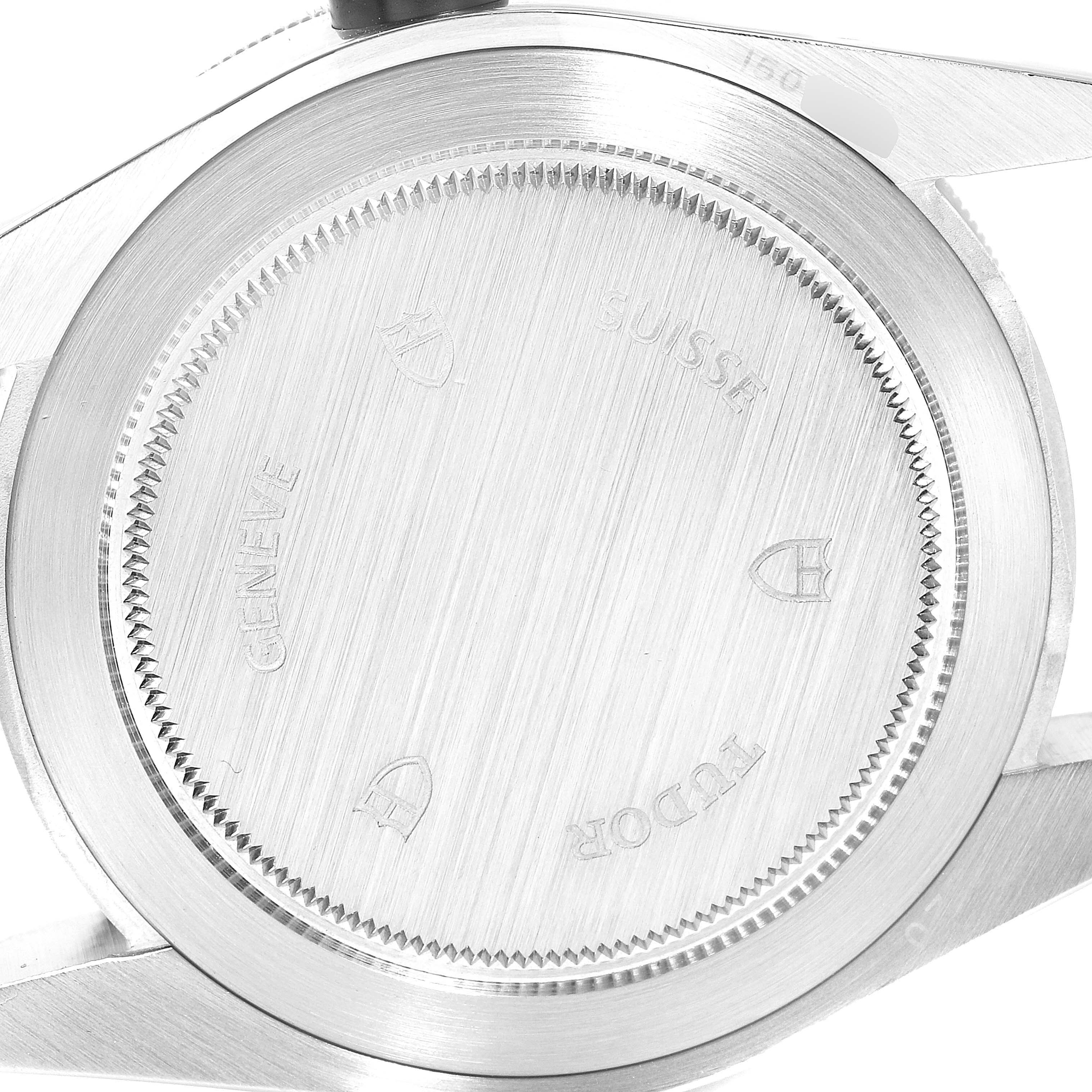 This image shows the case back of the Tudor Heritage Black Bay 79220 Men
s Stainless Steel Black Dial 79220 Men
s Stainless Steel Black Dial watch, angled directly from the back.