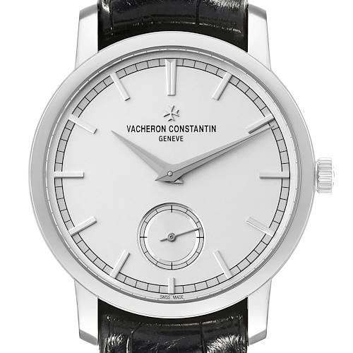 The image shows a frontal view of the Vacheron Constantin Traditionnelle watch, highlighting the dial, hands, and crown.