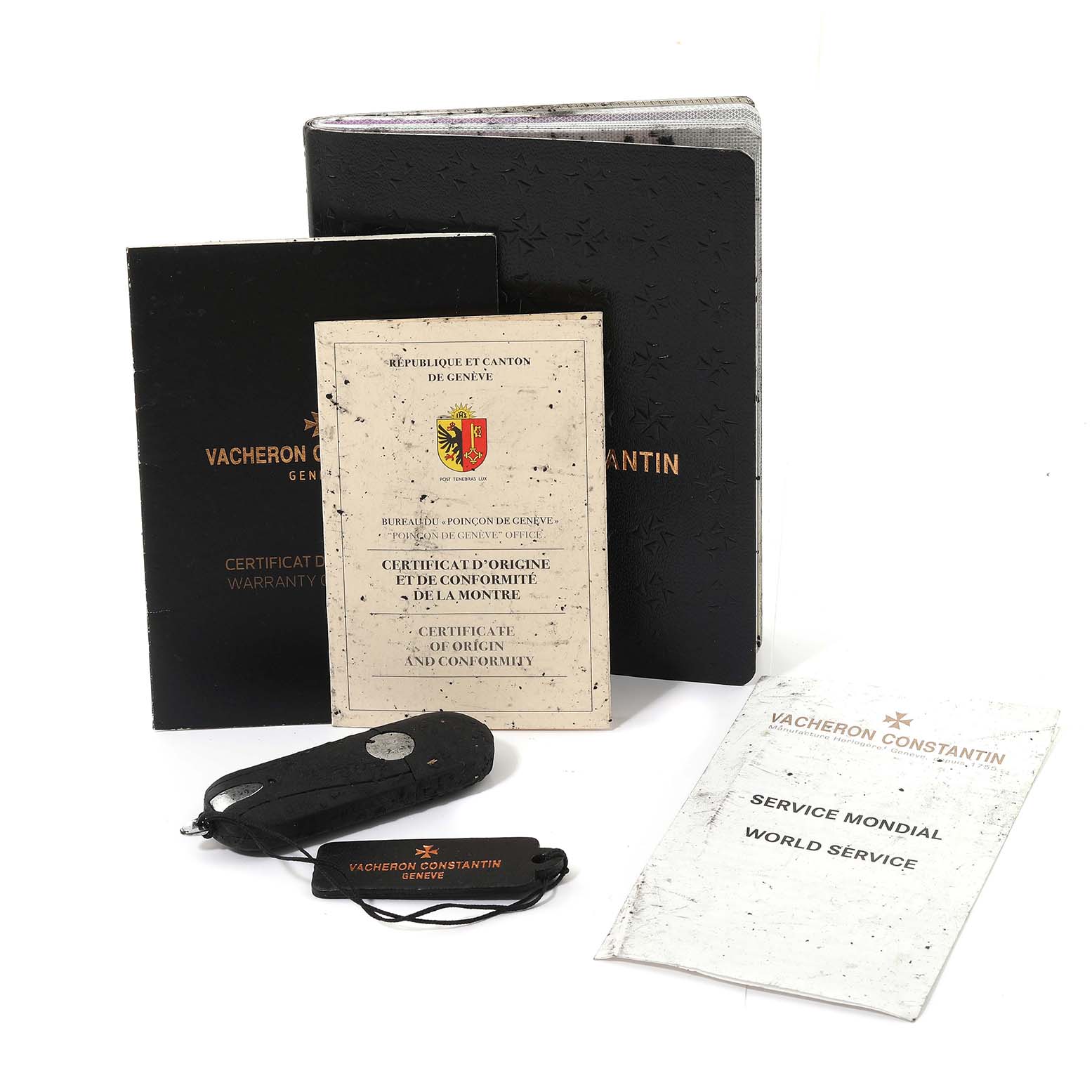 The image shows Vacheron Constantin Traditionnelle 82172/000G Men's White Gold Silver Dial 82172/000G Men's White Gold Silver Dial model watch accessories, including documentation and a carrying case.