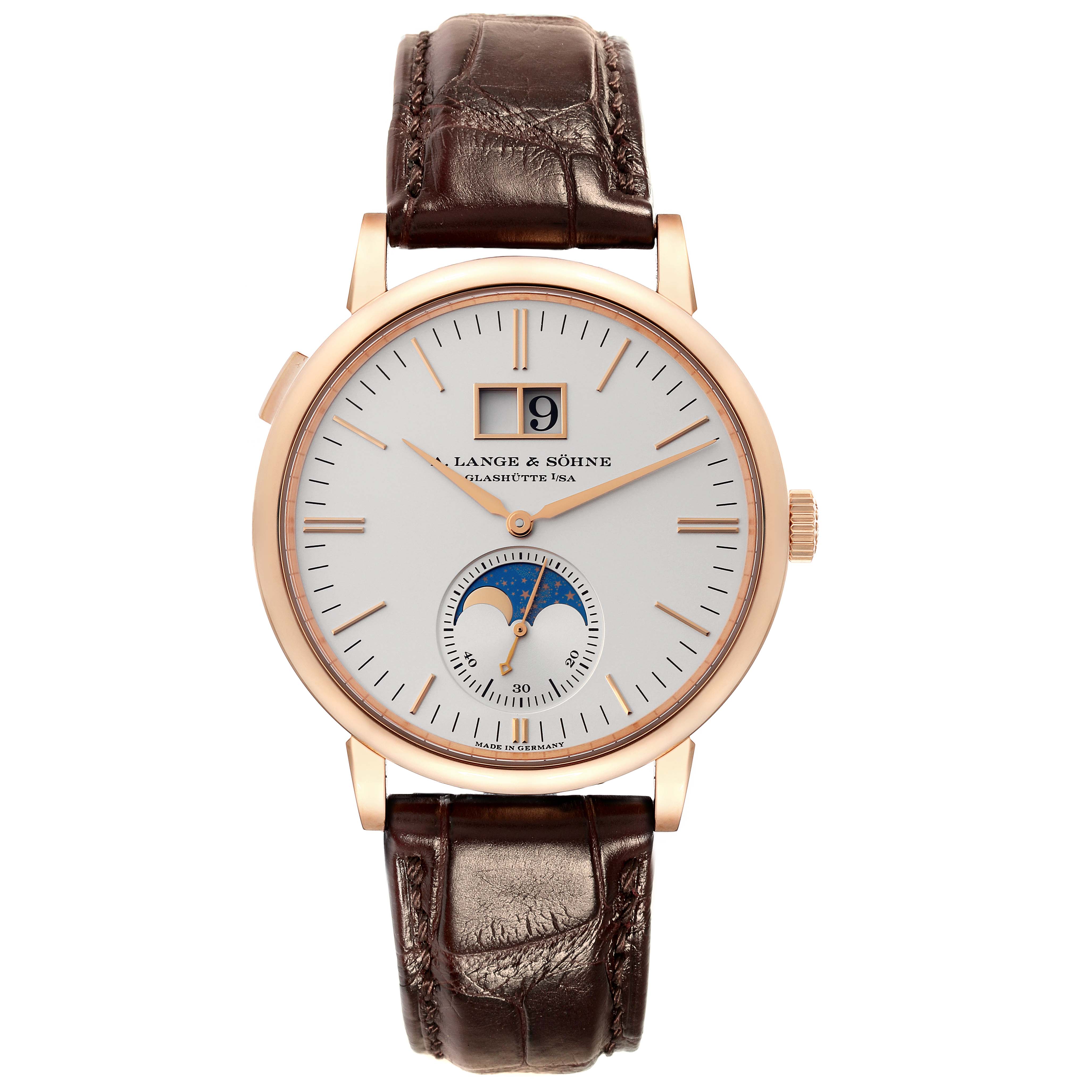 The image shows a front view of the Saxonia watch by A. Lange 
Söhne, featuring its dial, moon phase subdial, and brown leather strap.