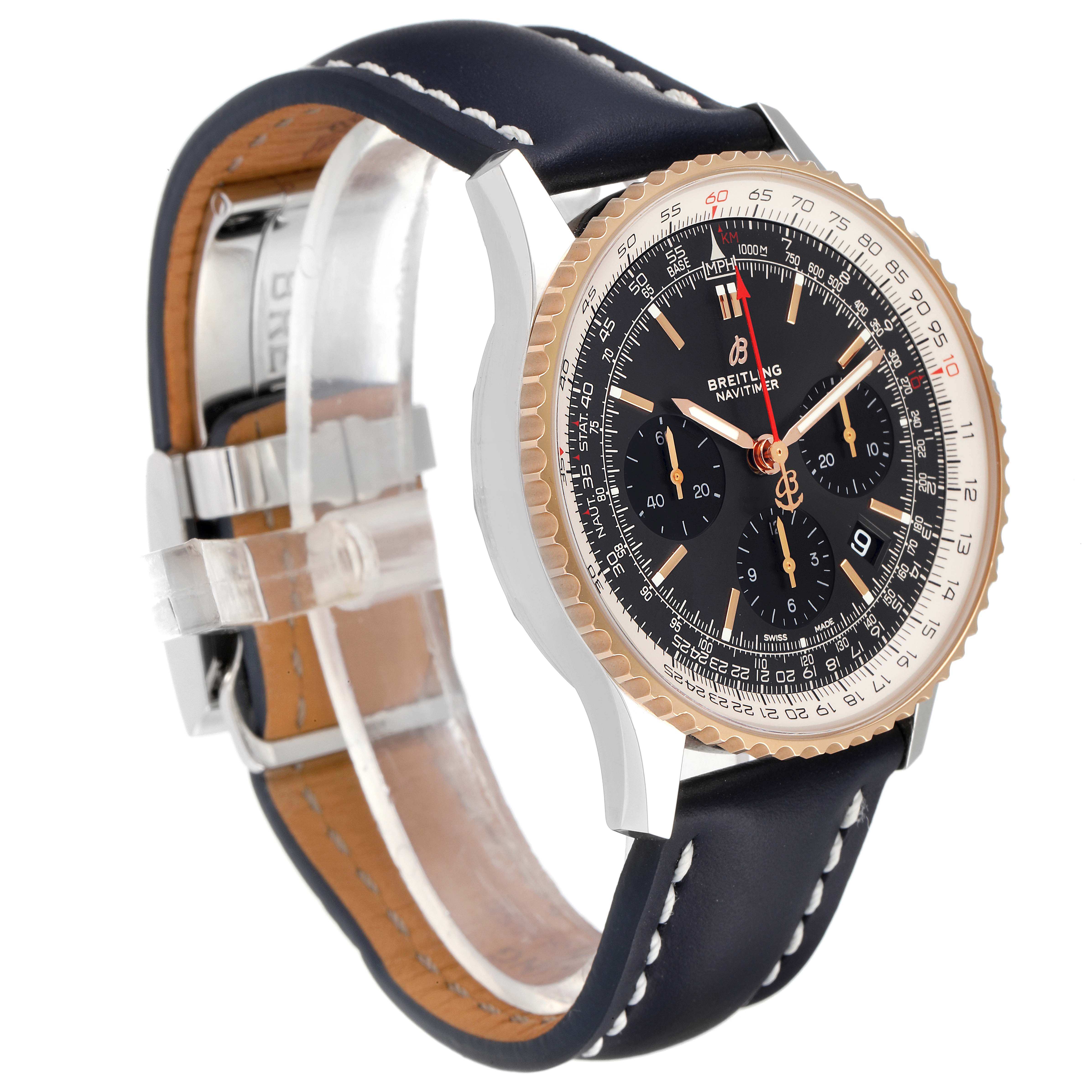 The Breitling Navitimer UB012121-F582-743P Men's Steel and Gold (two tone) Grey Dial UB012121-F582-743P Men's Steel and Gold (two tone) Grey Dial watch is shown at an angle, displaying its face, bezel, case, and leather strap with a buckle clasp.