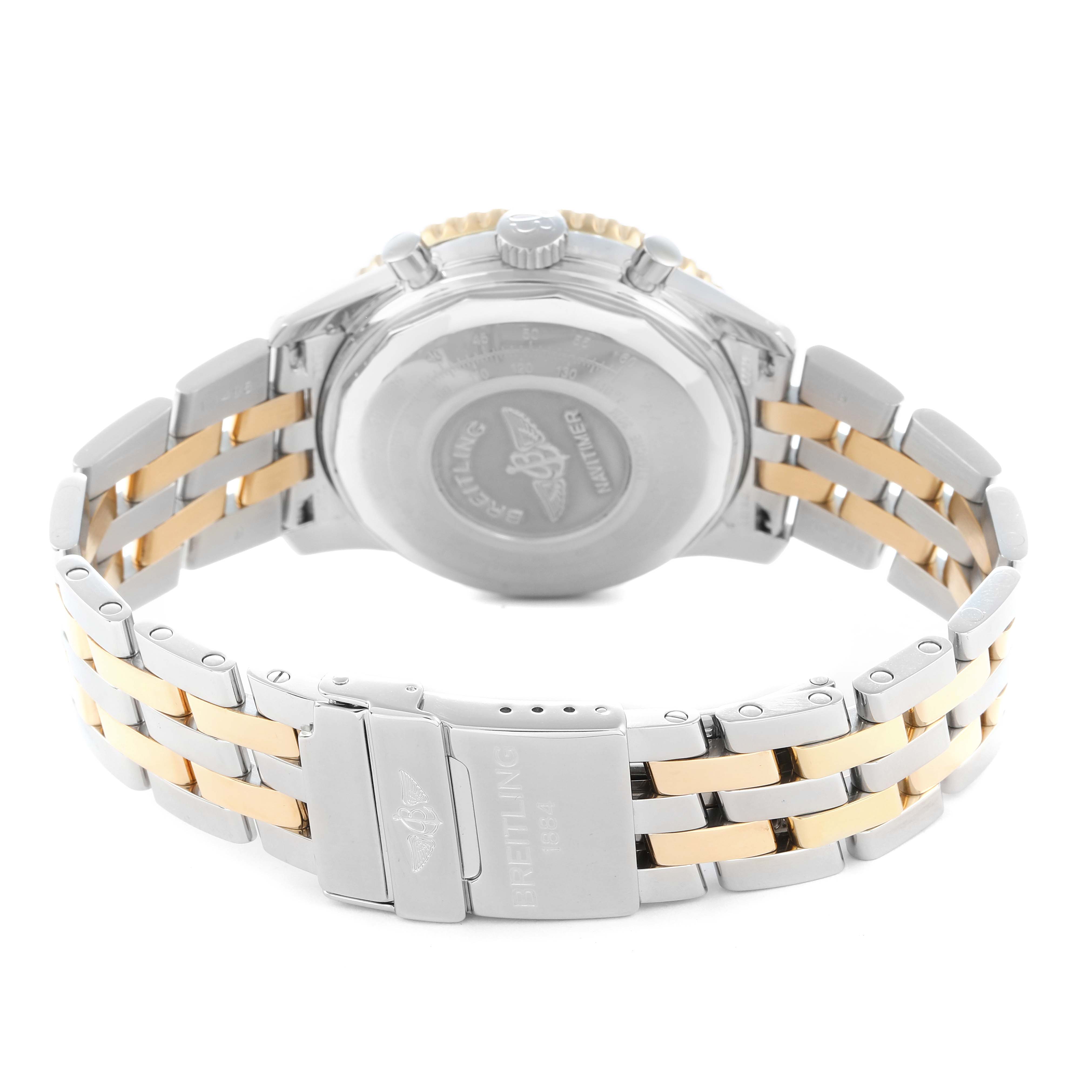 The image shows the back of a Breitling Navitimer D13022 Men
s Steel and Gold (two tone) Black Dial watch, featuring its clasp and two-tone metal bracelet.