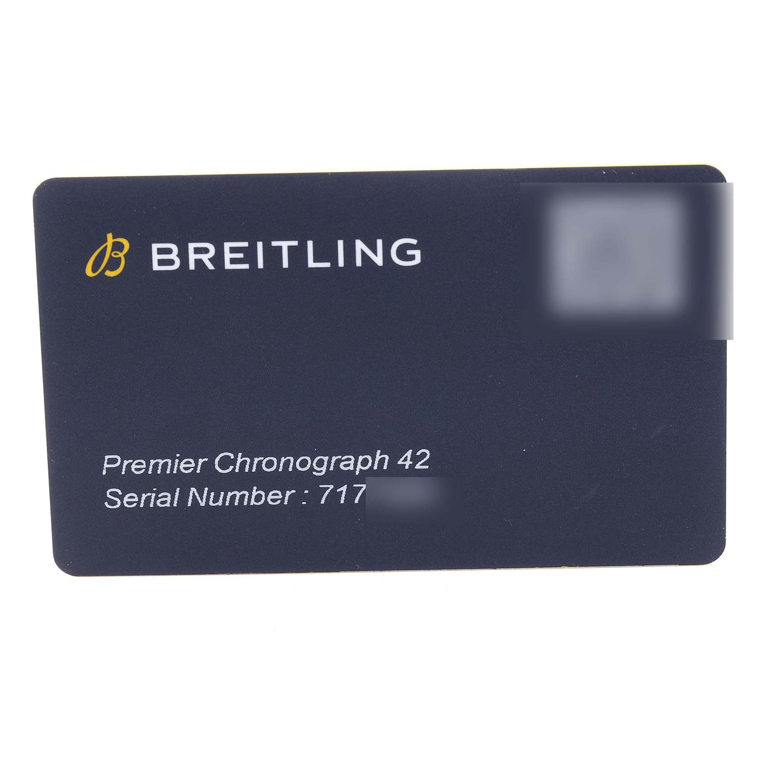 The image shows a close-up of a Breitling Premier A13315 Men's Stainless Steel Blue Dial A13315 Men's Stainless Steel Blue Dial Chronograph 42 warranty card.