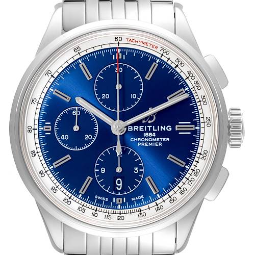 The image shows a front view of the Breitling Premier watch, featuring its blue dial, chronograph subdials, and stainless steel band.