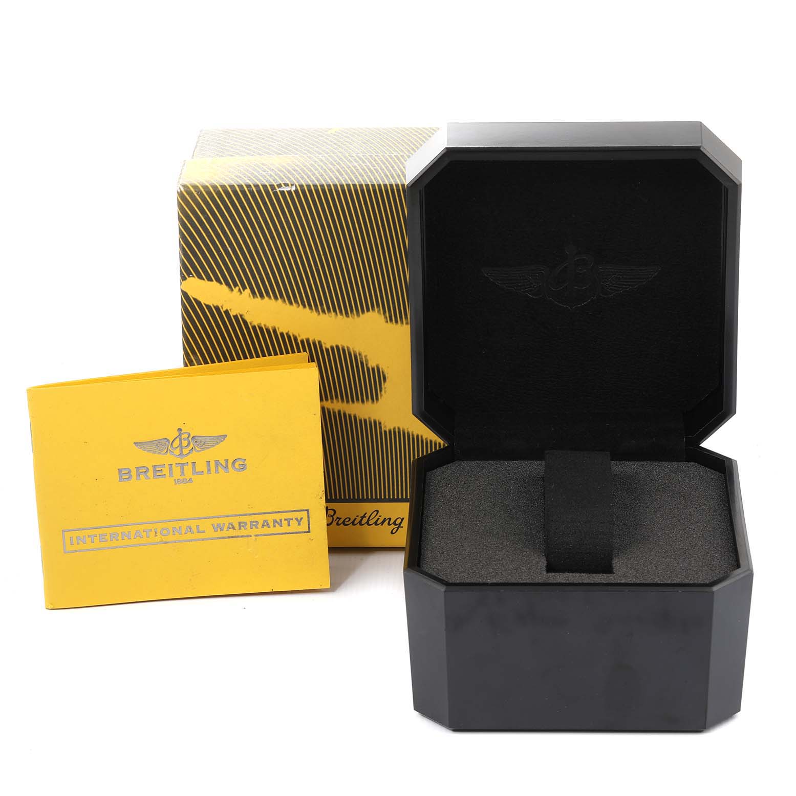 The image shows a Breitling Superocean A17390 Men
s Stainless Steel Black Dial A17390 Men
s Stainless Steel Black Dial watch box, an outer box, and an international warranty card.