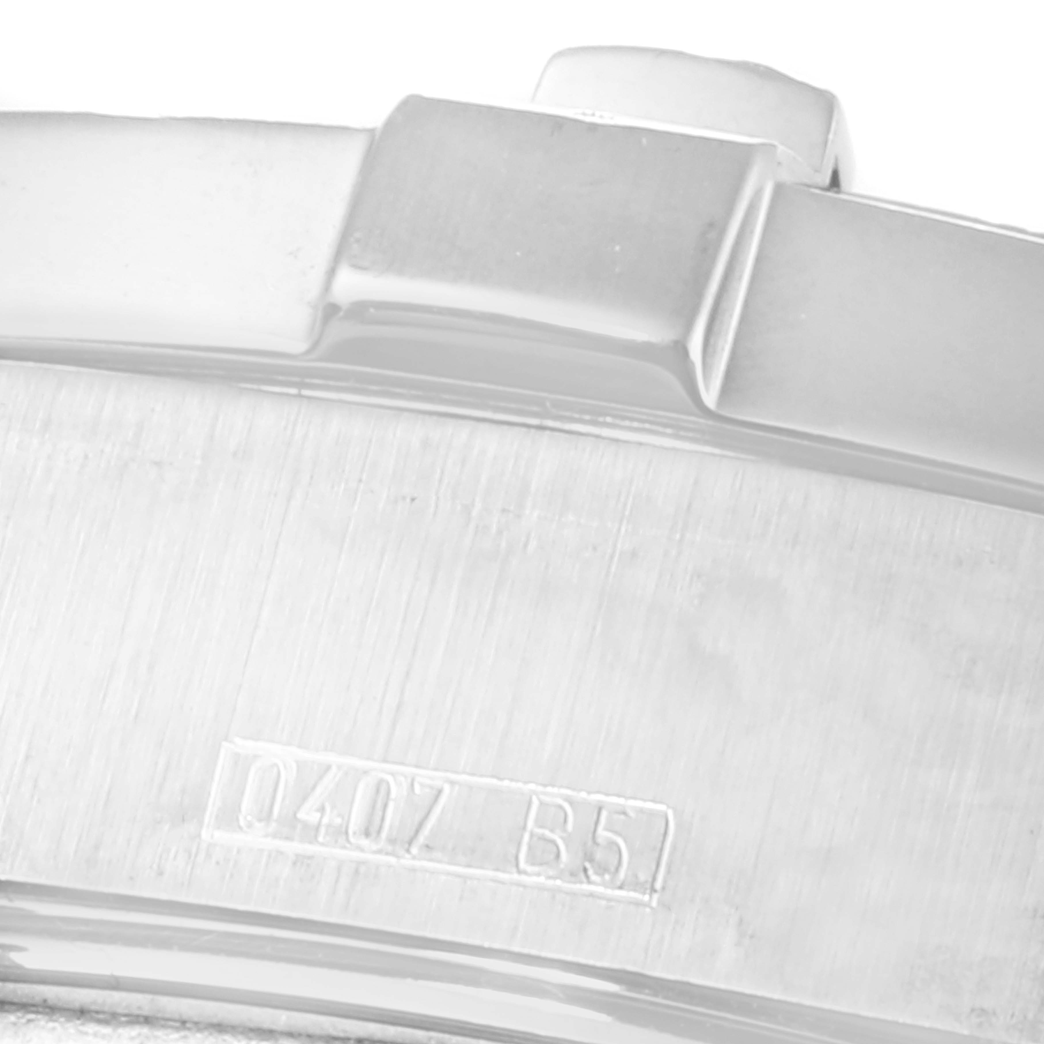 Close-up of the Breitling Superocean A17390 Men
s Stainless Steel Black Dial A17390 Men
s Stainless Steel Black Dial watch case showing a portion of the polished bezel and engraved markings.