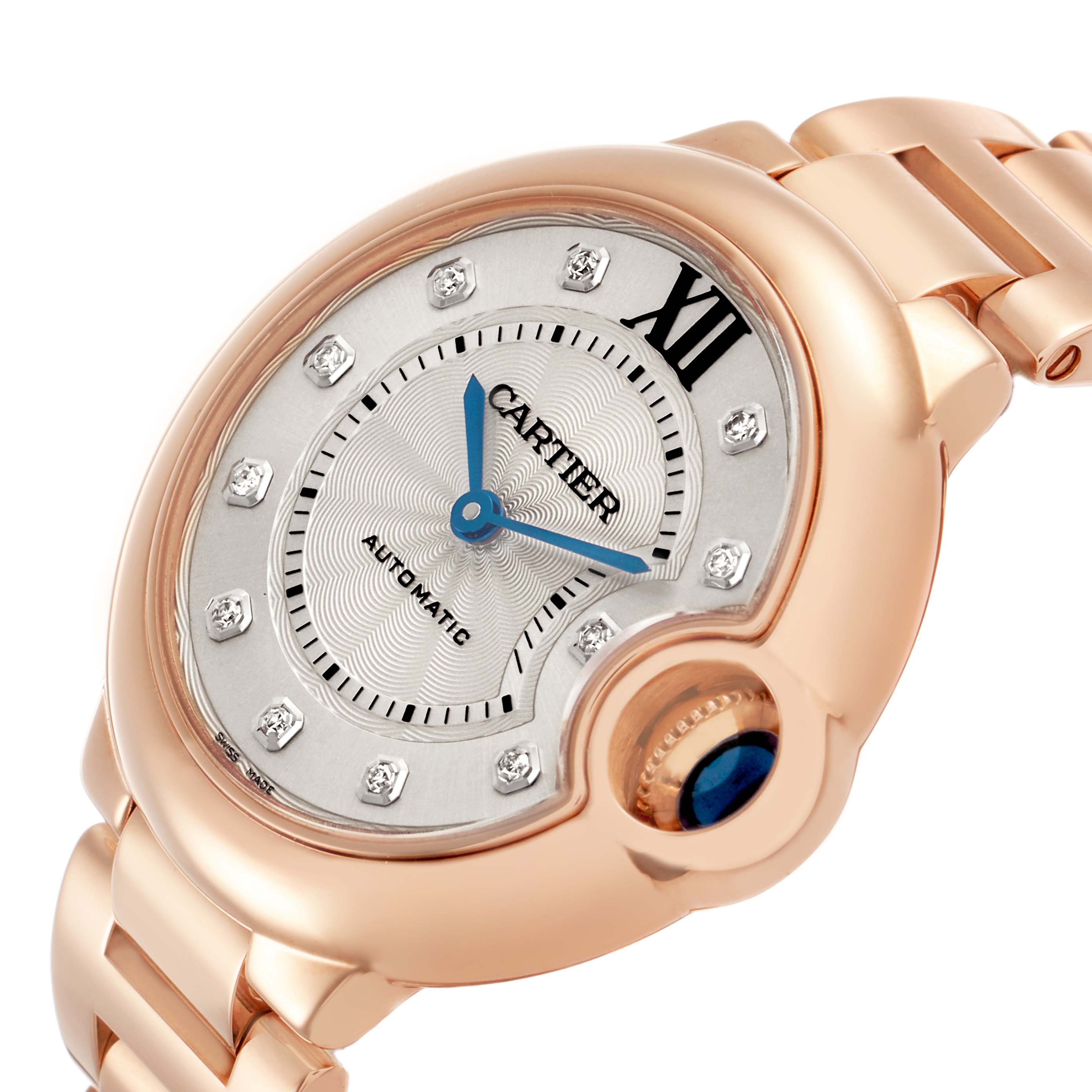 The Cartier Ballon Bleu WE902039 Women's Rose Gold Silver Dial watch is shown from an angled top view, highlighting the face and crown with its signature blue cabochon.