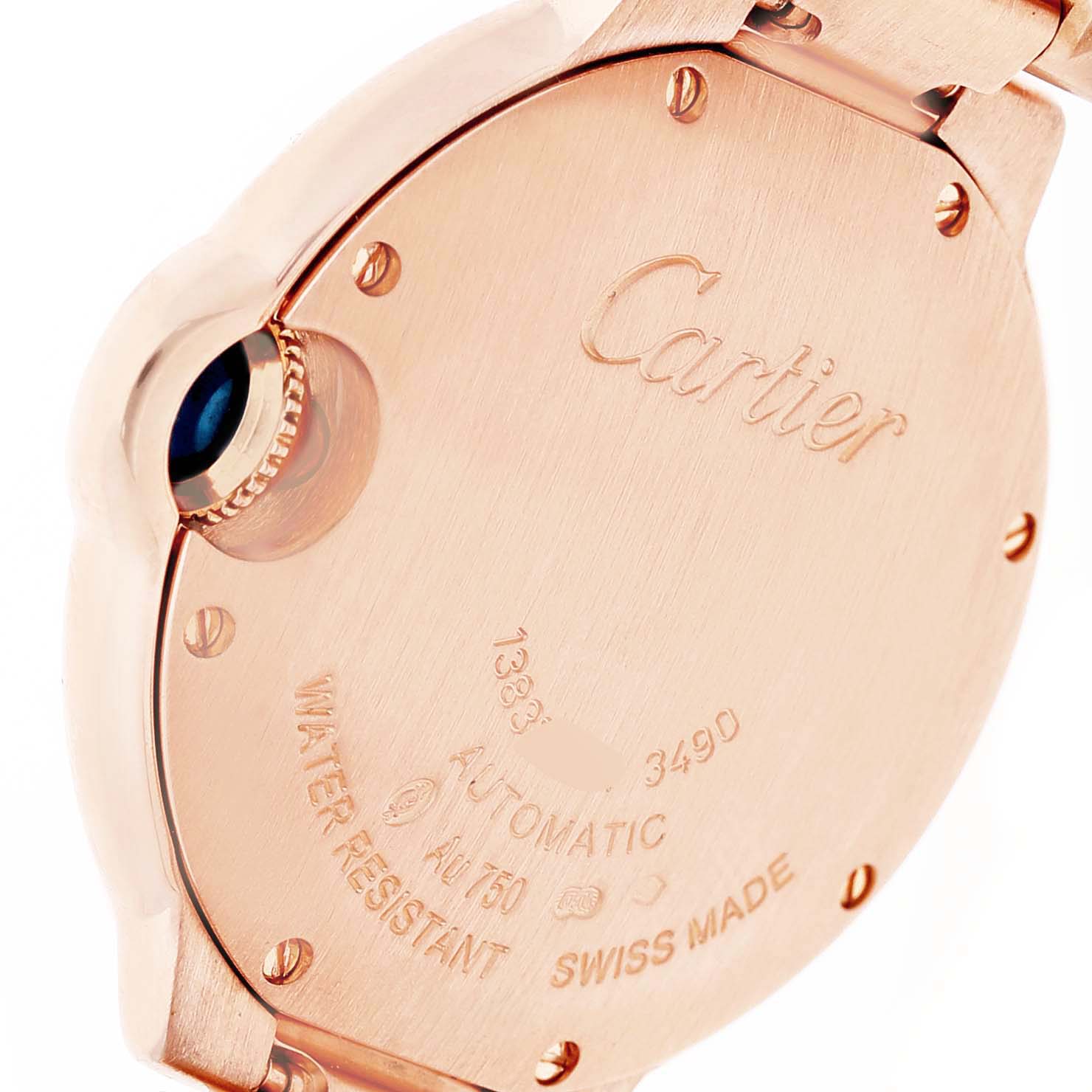 The image shows the back of the Cartier Ballon Bleu WE902039 Women's Rose Gold Silver Dial, showcasing the case, inscriptions, and crown.