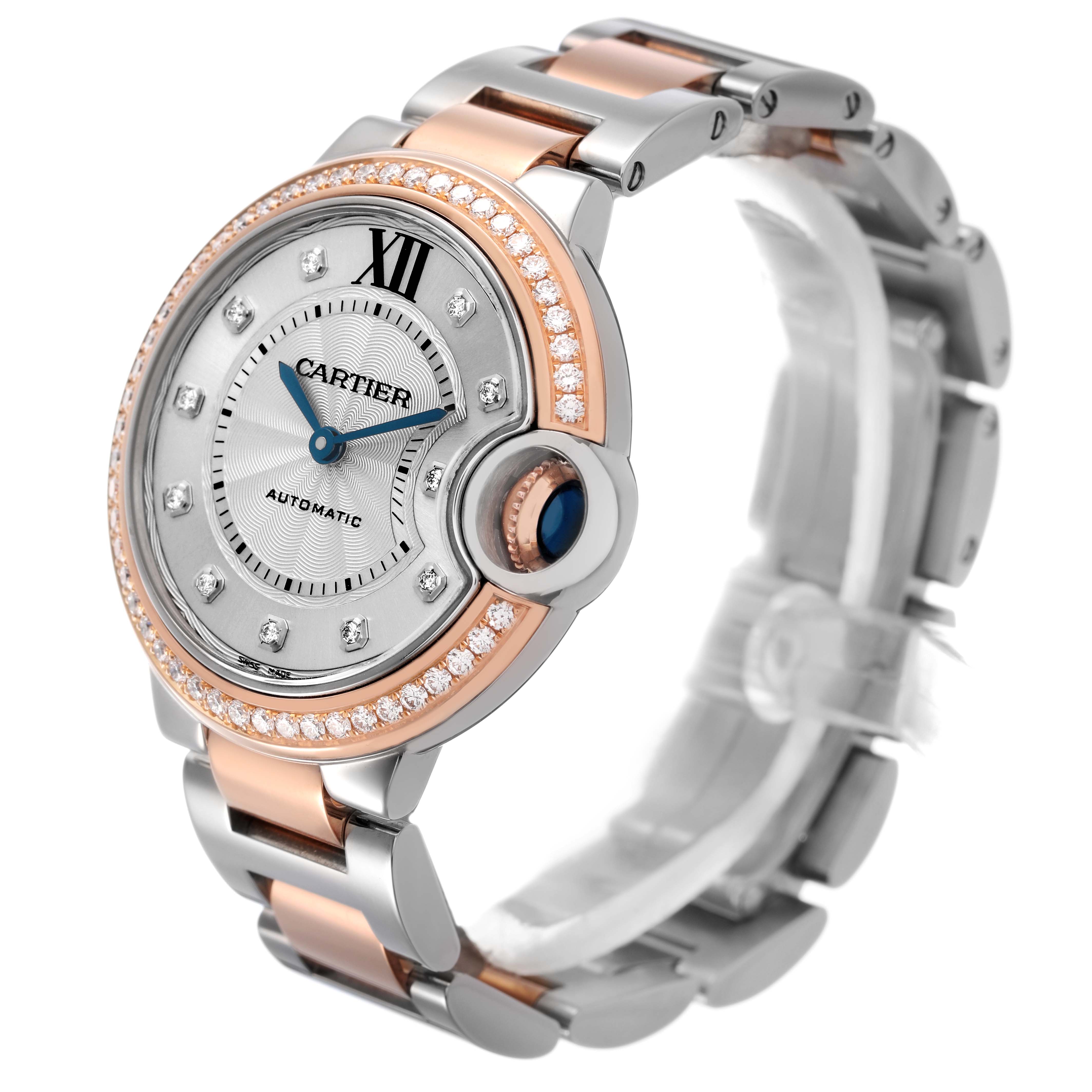 The Cartier Ballon Bleu WE902077 Women's Steel and Gold (two tone) Silver Dial watch is shown at an angled view, highlighting the face, bracelet, and diamond-studded bezel.