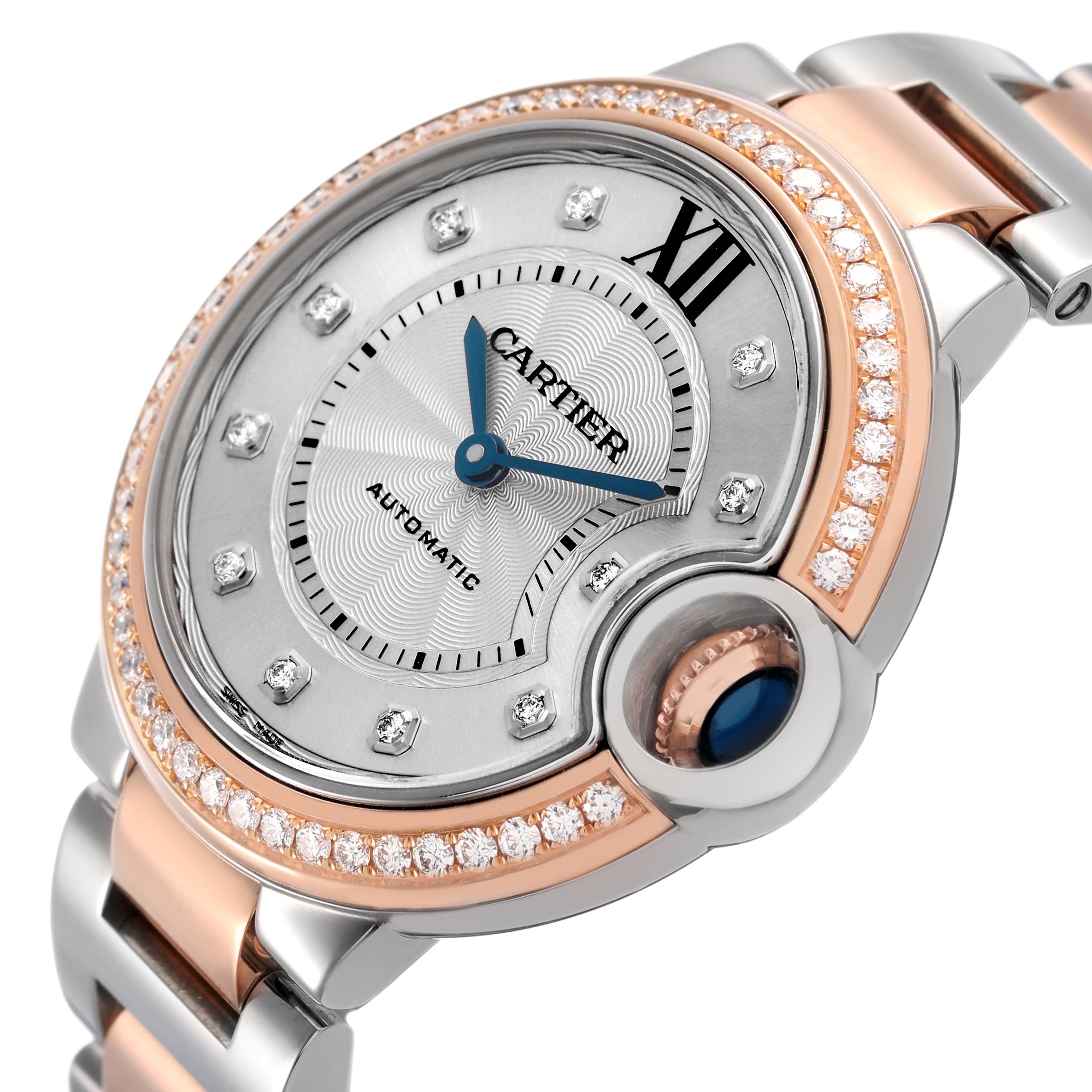 The Cartier Ballon Bleu WE902077 Women's Steel and Gold (two tone) Silver Dial watch is shown at a three-quarter angle highlighting the dial, crown with blue cabochon, and diamond bezel.