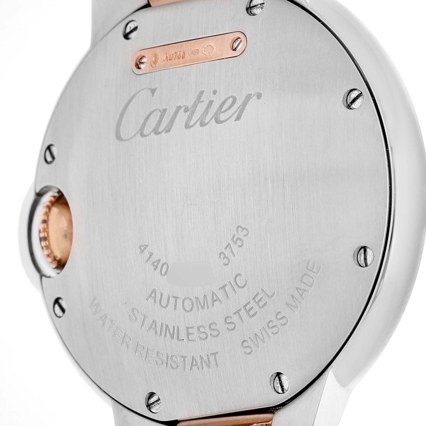 The image shows the back of the Cartier Ballon Bleu WE902077 Women's Steel and Gold (two tone) Silver Dial watch, featuring engravings and the crown's side view.