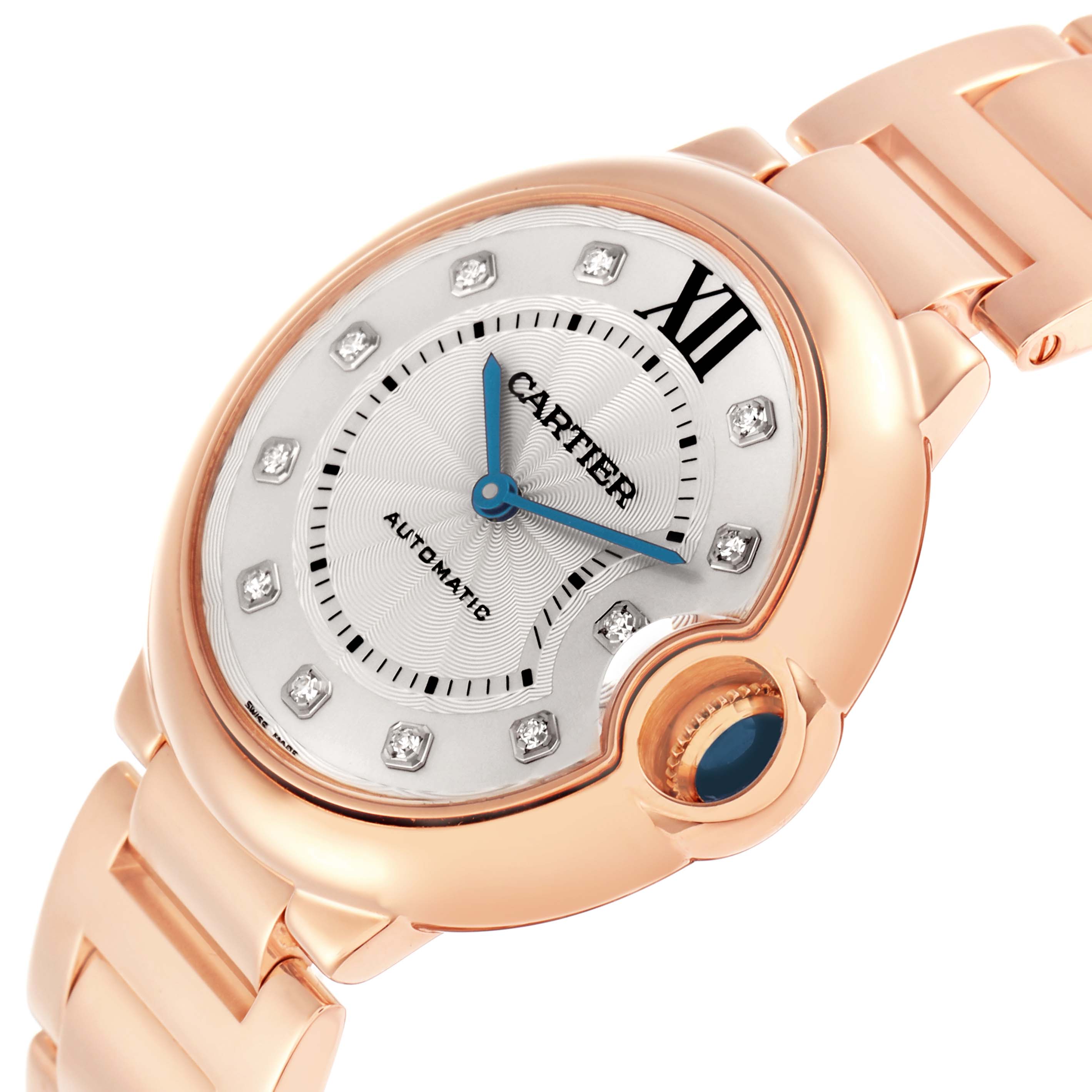 The Cartier Ballon Bleu WE902026 Women
s Rose Gold Silver Dial watch is shown from an angled perspective, highlighting the dial, crown, and part of the bracelet.