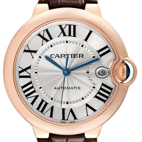 The image shows the face of the Cartier Ballon Bleu watch, featuring Roman numerals, blue hands, and a date window.