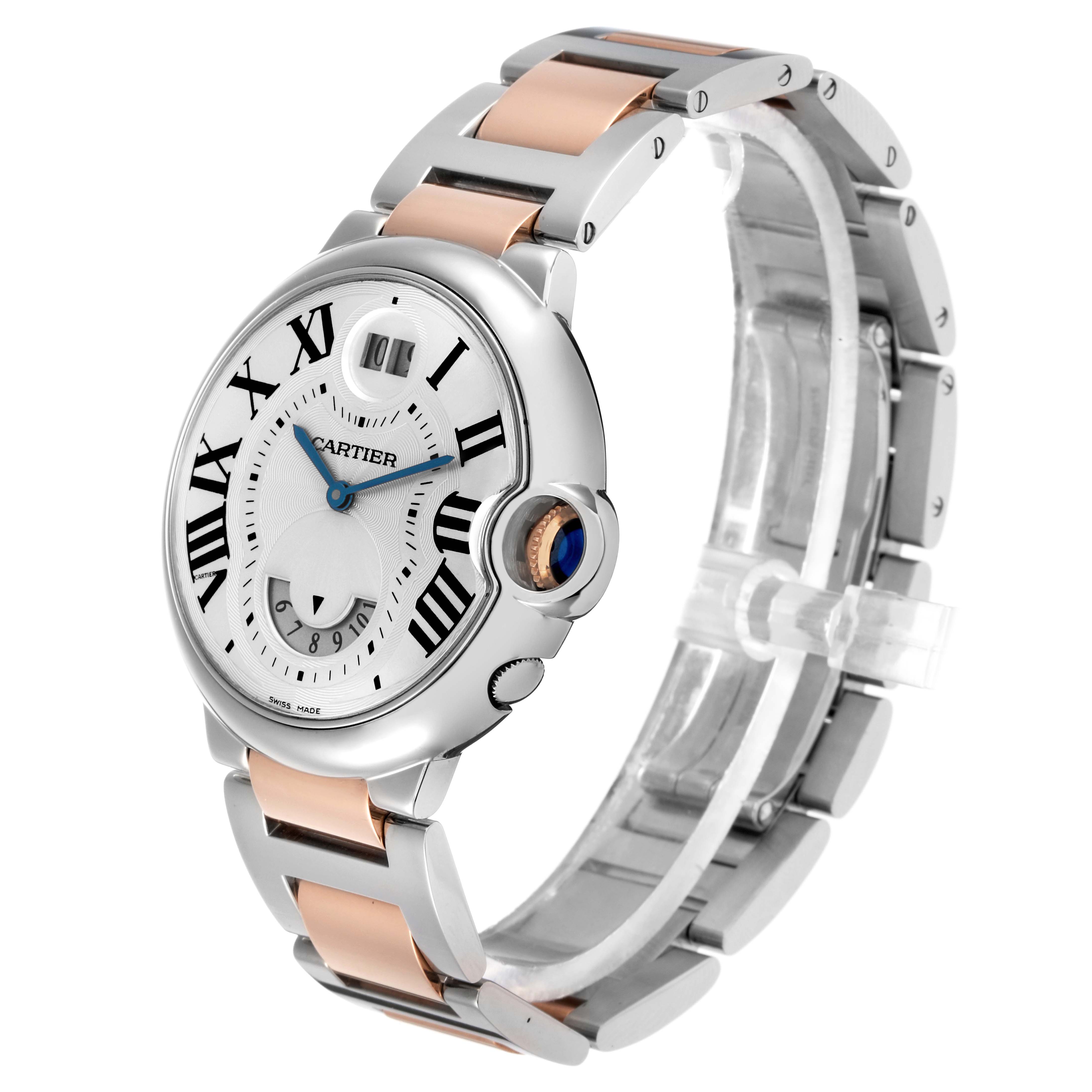 The Cartier Ballon Bleu W6920027 Men
s Steel and Gold (two tone) Silver Dial watch is shown at an angle displaying the face, bezel, crown, and part of its metal bracelet.