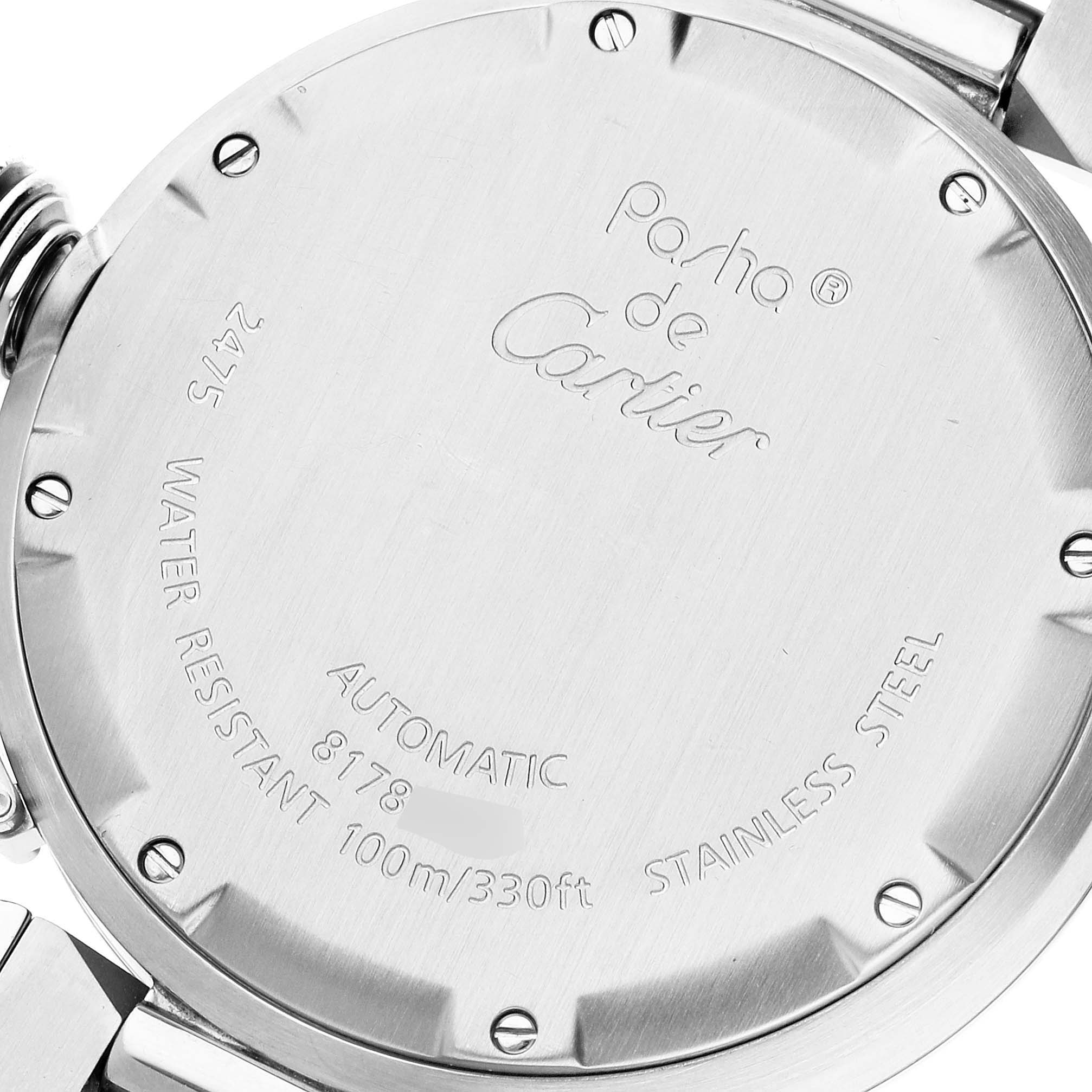 The image shows the back case of a Pasha de Cartier watch, highlighting details like water resistance, material, and model information.