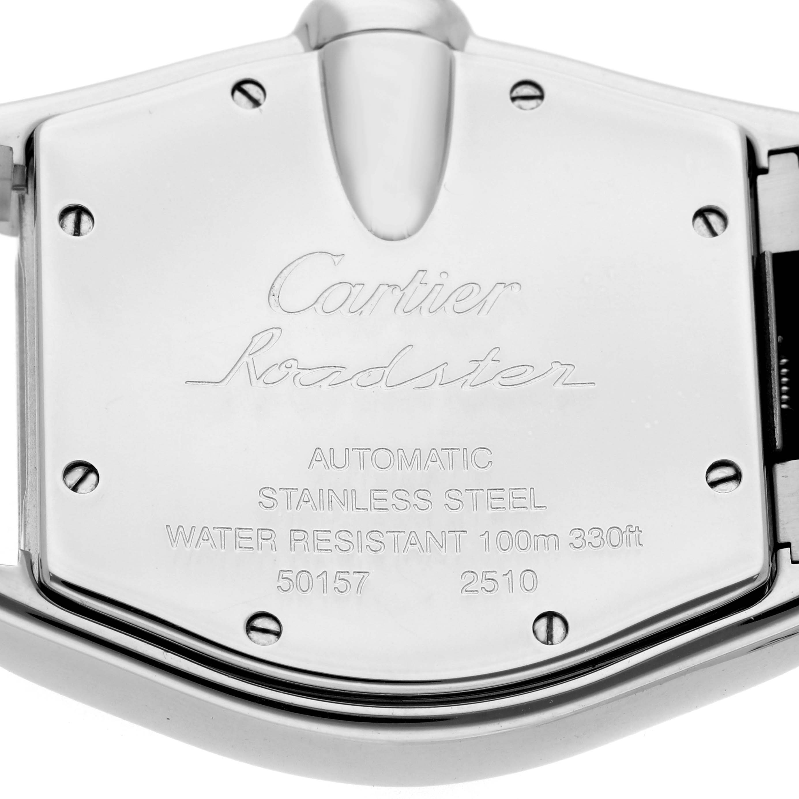 The image shows the back of a Cartier Roadster W62041V3 Men
s Stainless Steel Black Dial watch case, featuring engraved details and screws.