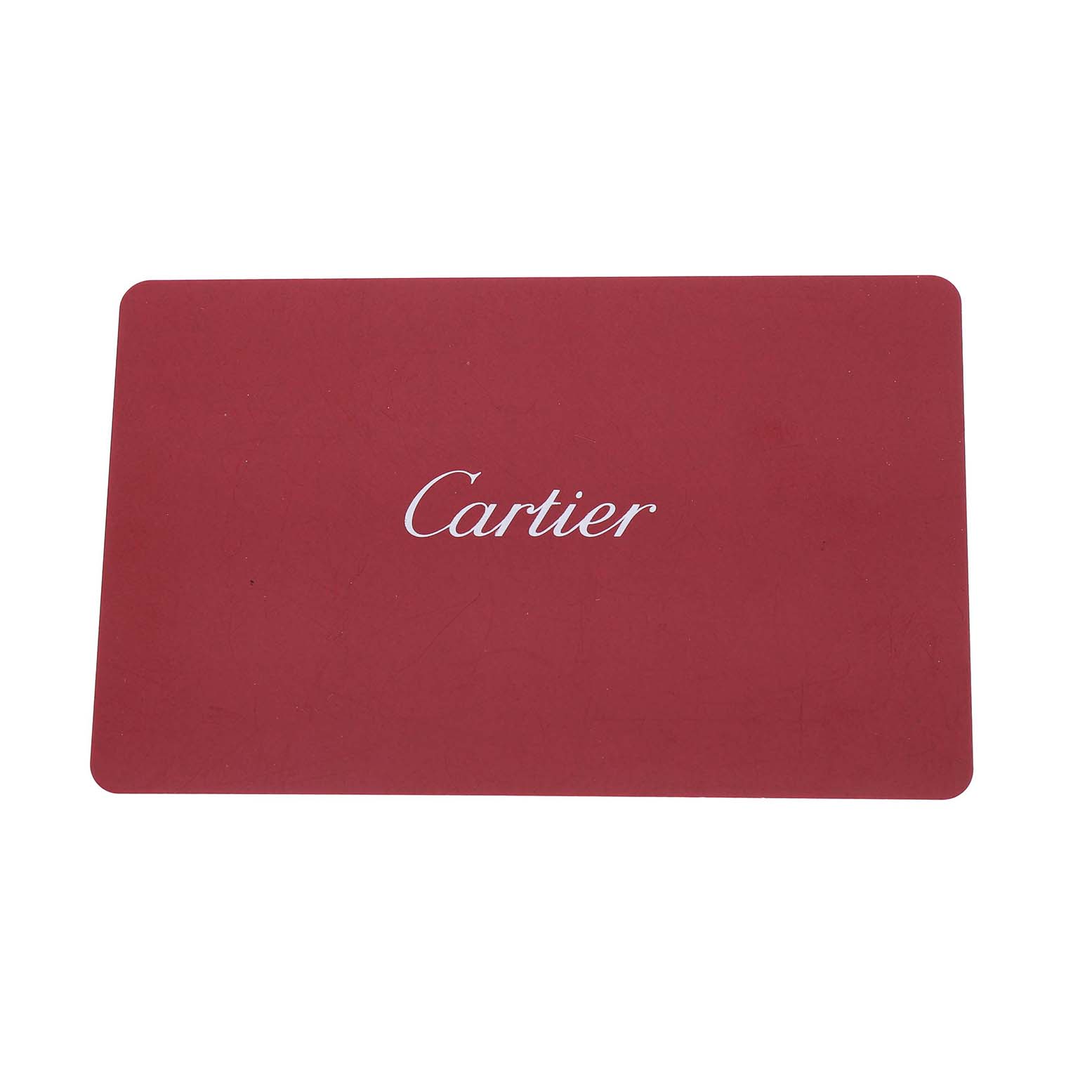 The image shows a red rectangular card with the Cartier logo, likely related to the Cartier Roadster W62017V3 Women's Stainless Steel Pink Dial model.