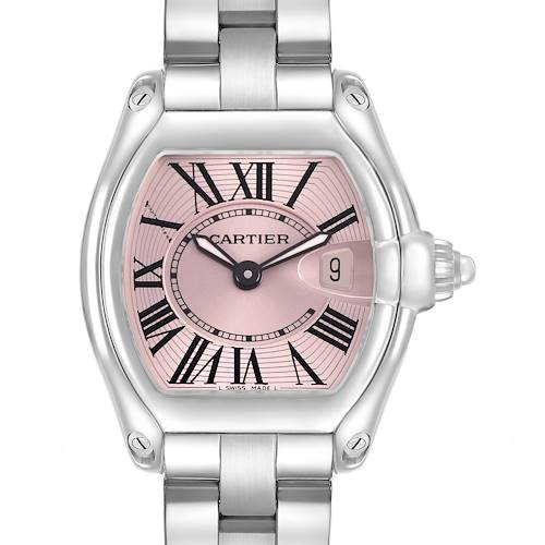 The Cartier Roadster W62017V3 Women's Stainless Steel Pink Dial watch is displayed from a front angle, showing its pink dial, Roman numerals, and metal bracelet.