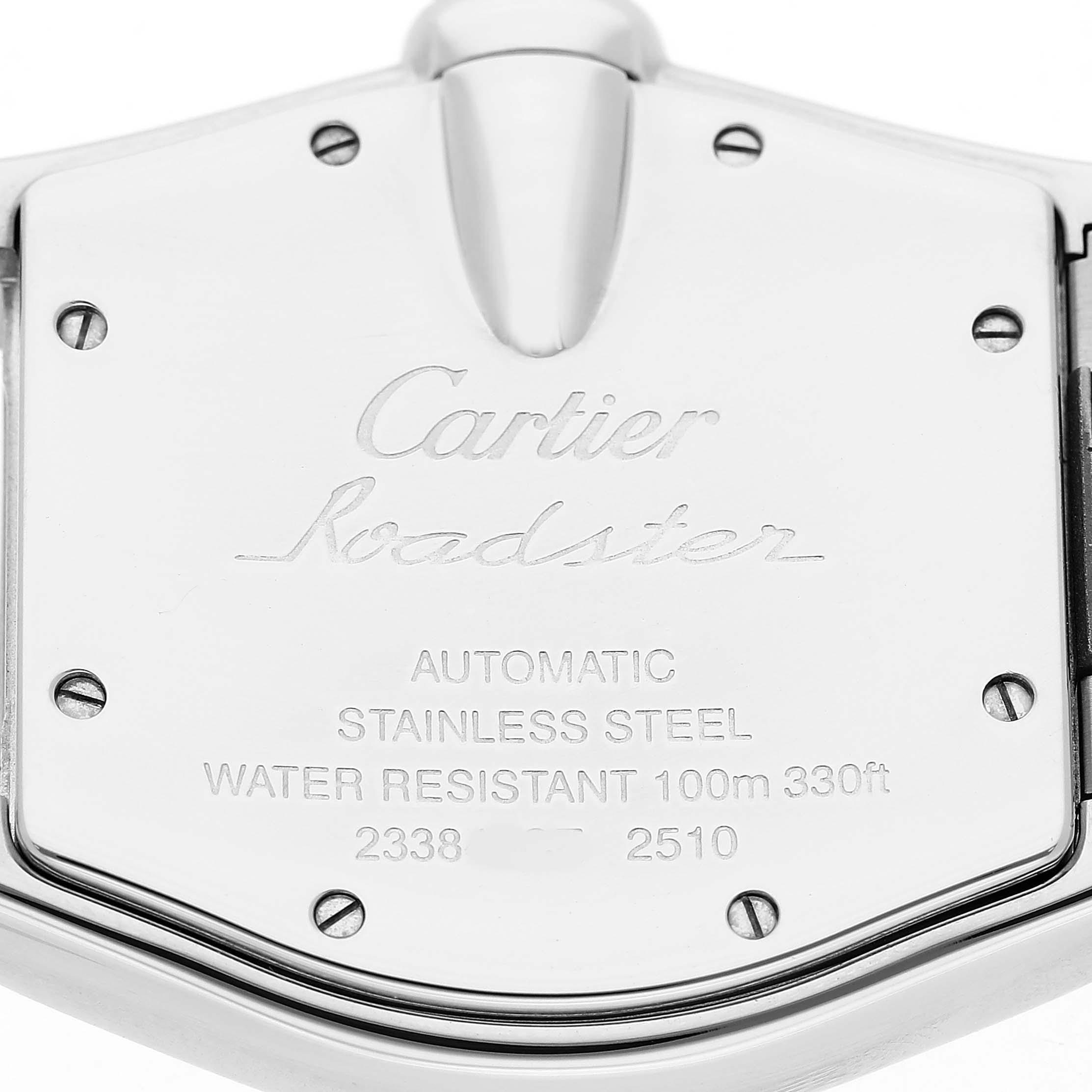 The image shows the back case of a Cartier Roadster W62031Y4 Men's Stainless Steel Silver Dial watch, highlighting inscriptions and screws.
