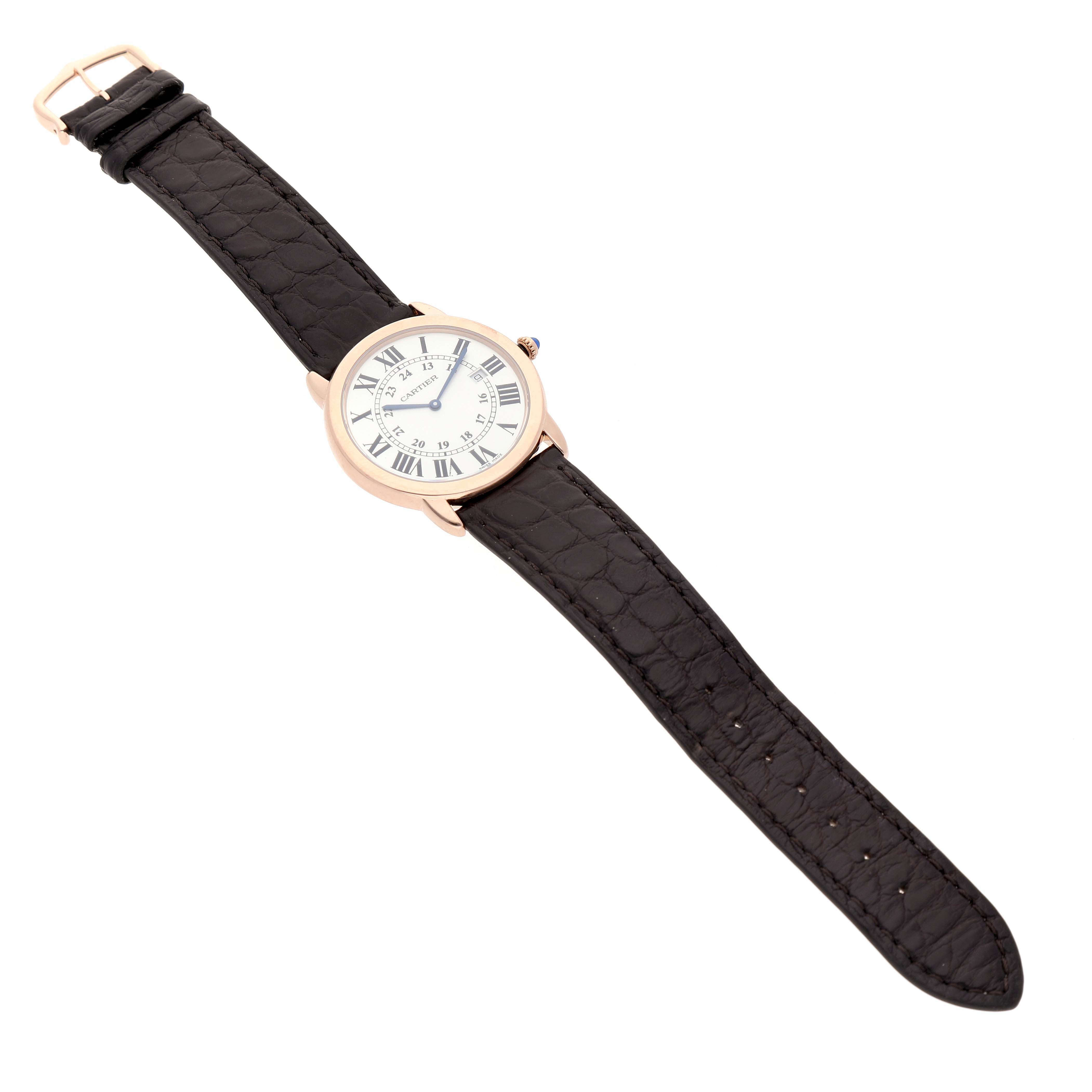 The Cartier Ronde W6701008 Men's Rose Gold Silver Dial watch is shown at an angled top view, displaying its round dial, Roman numerals, and a black leather strap.