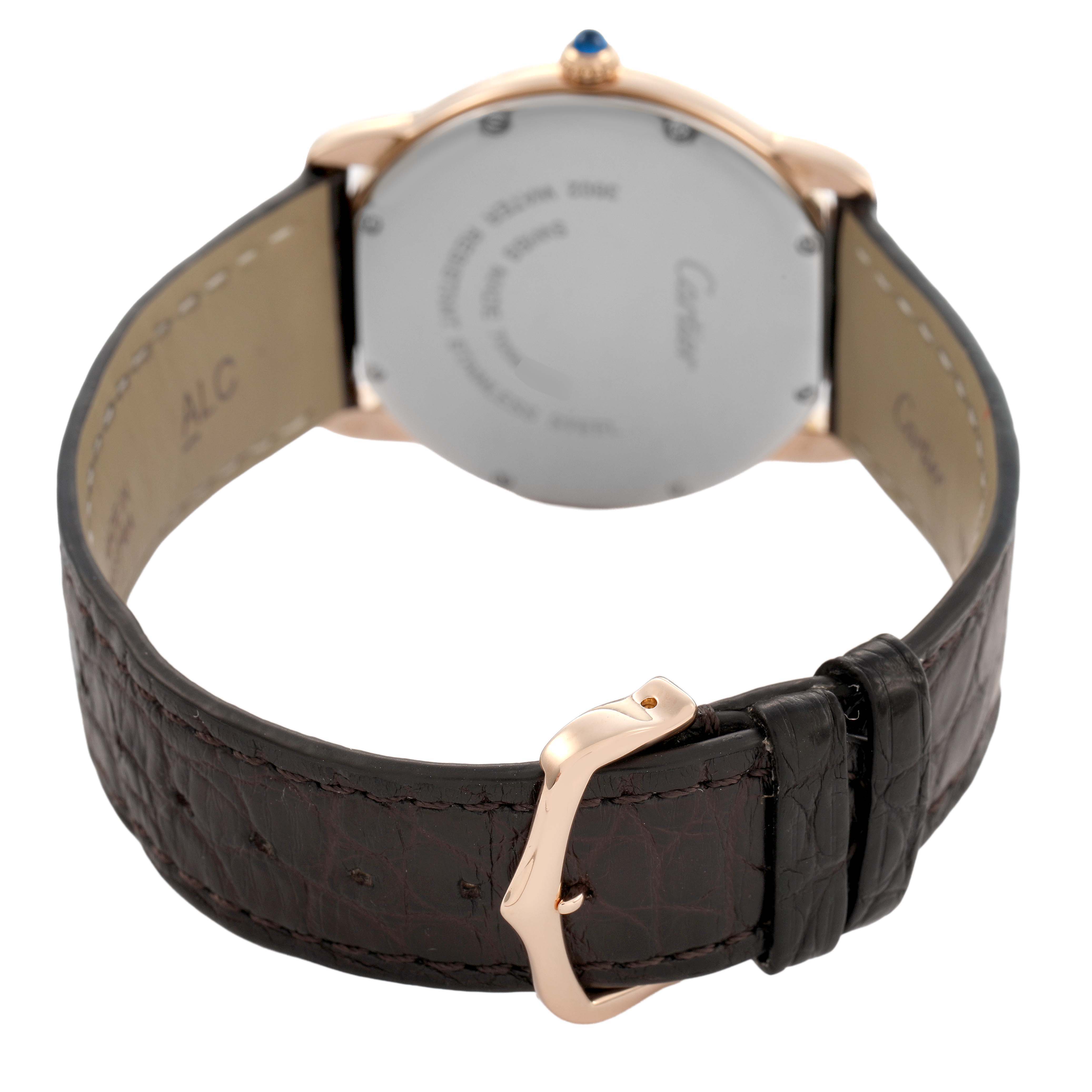 The image shows the back of the Cartier Ronde W6701008 Men's Rose Gold Silver Dial watch, highlighting the case back, crown, and leather strap with a buckle.