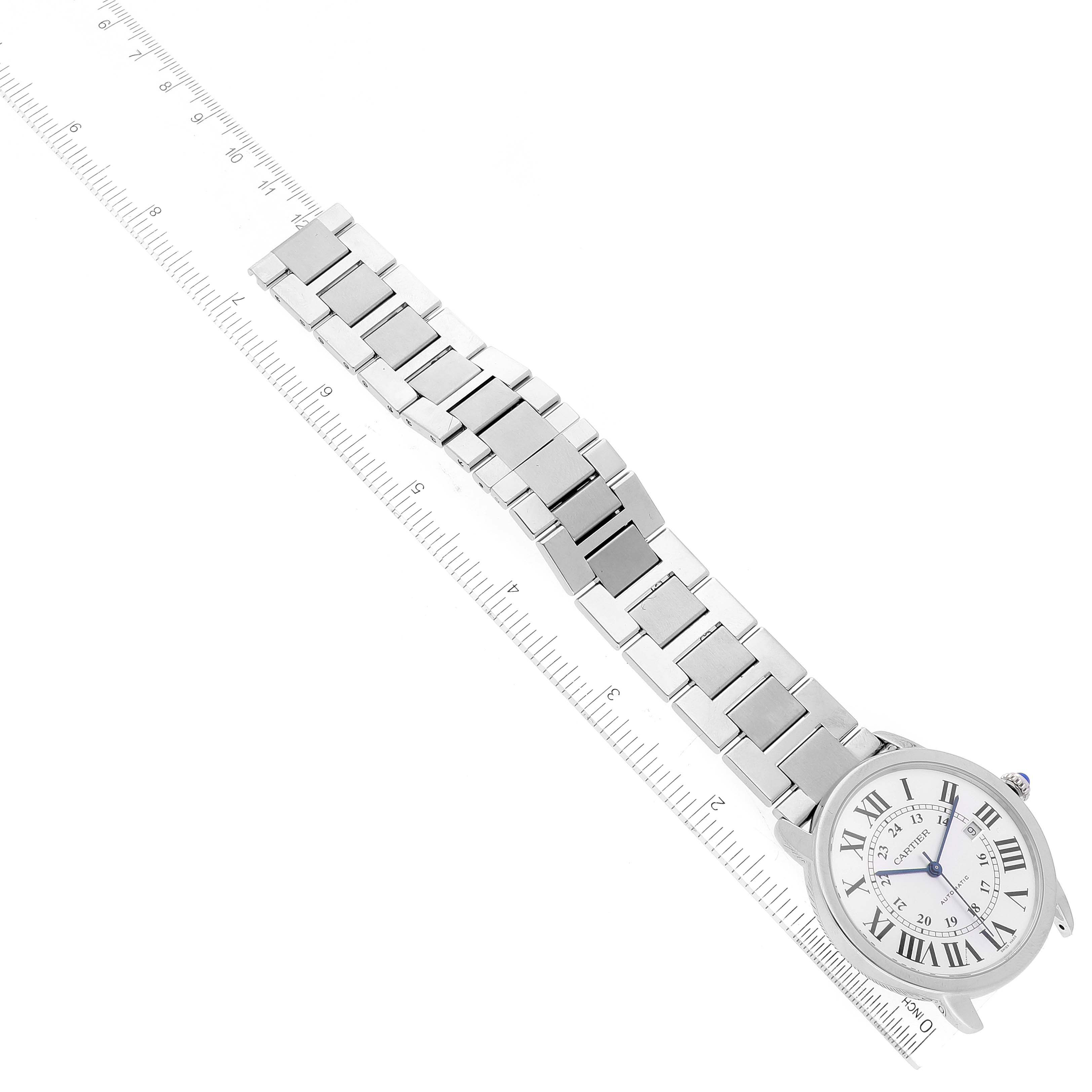 The Cartier Ronde W6701011 Men
s Stainless Steel Silver Dial W6701011 Men
s Stainless Steel Silver Dial watch is shown at an angle with the face, metal bracelet, and ruler for size reference.