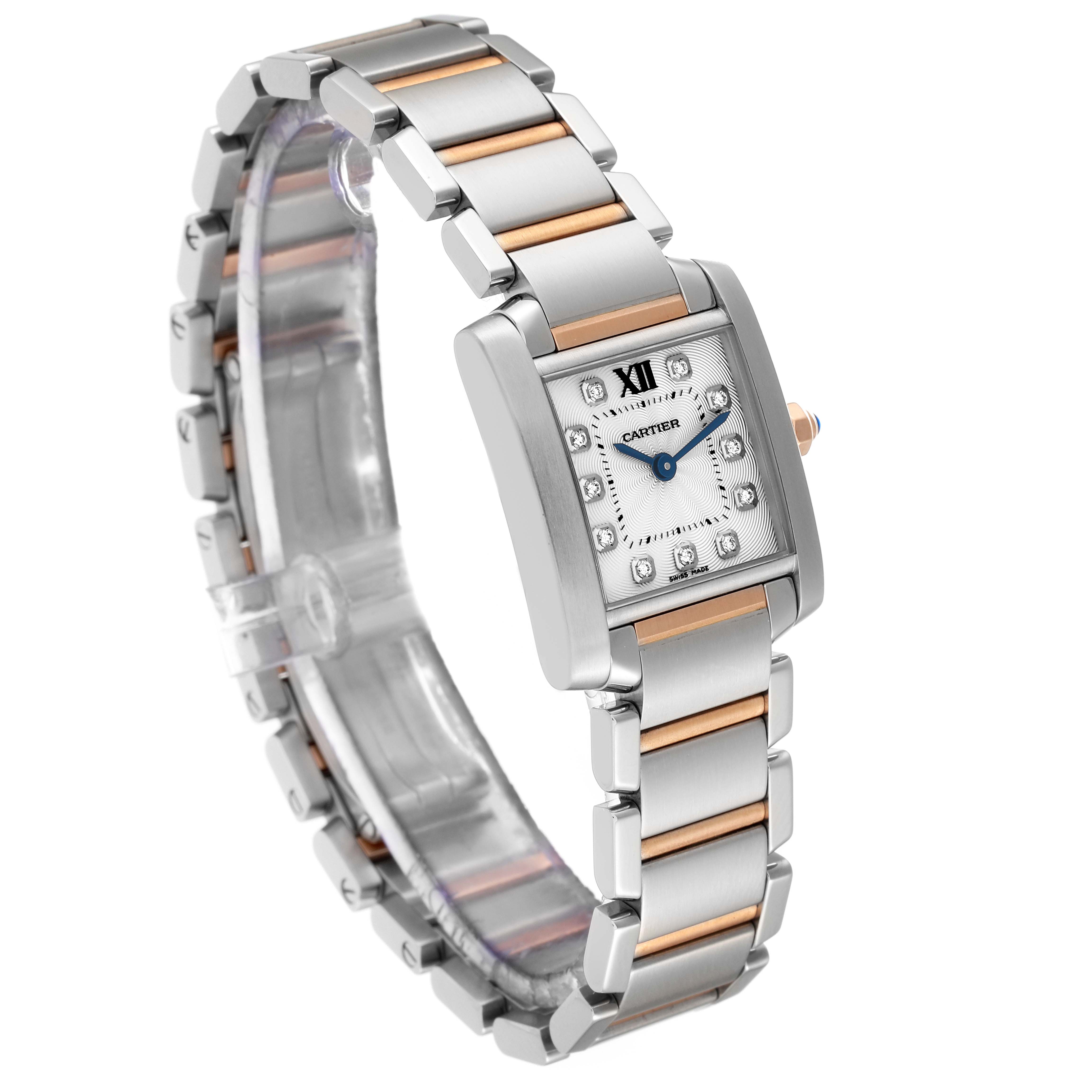 The image shows a three-quarter angle view of a Cartier Tank Francaise WE110004 Women
s Steel and Gold (two tone) Silver Dial WE110004 Women
s Steel and Gold (two tone) Silver Dial watch, highlighting its face, bezel, bracelet, and crown.