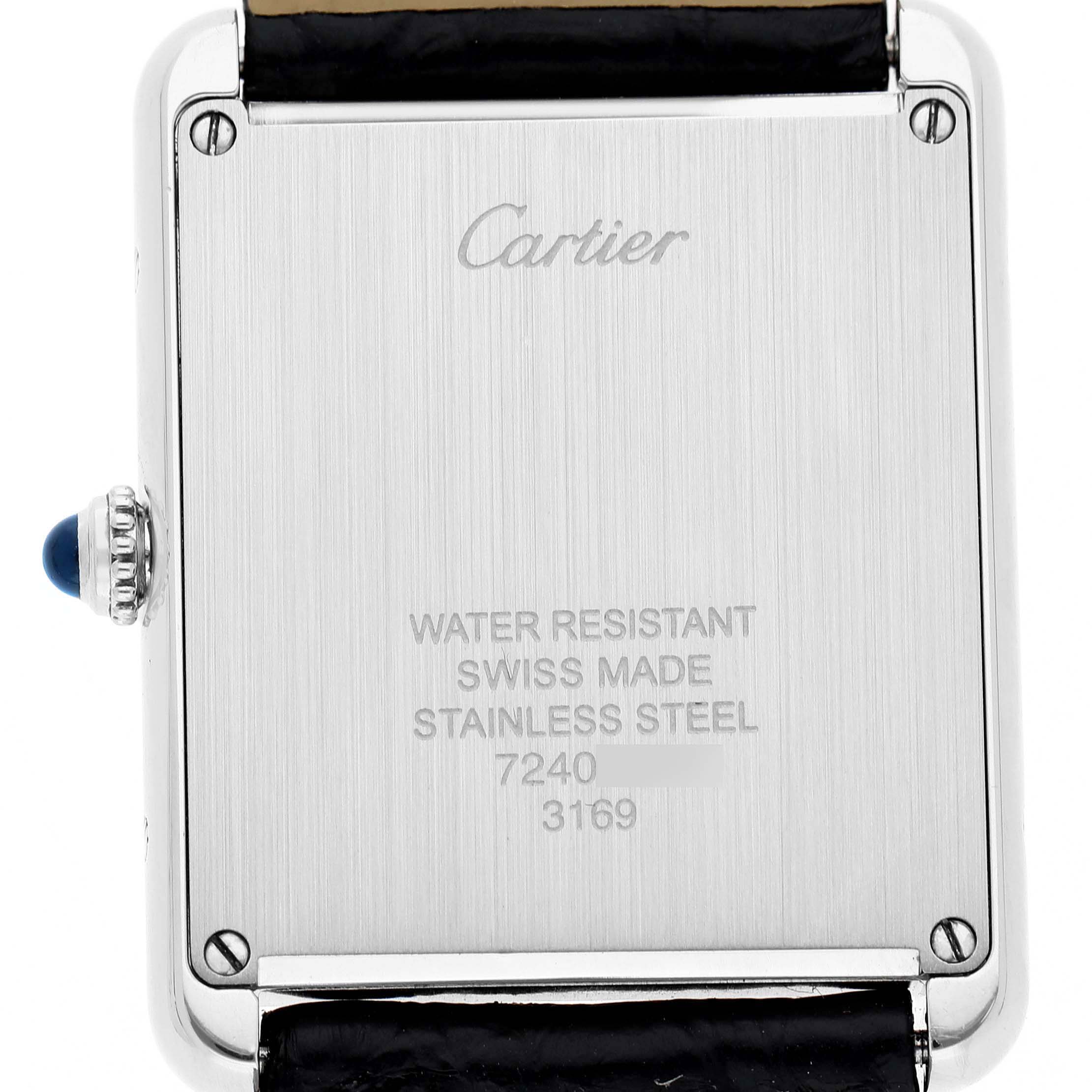 This image shows the back casing of the Cartier Tank Solo W5200003 Men's Stainless Steel Silver Dial watch, highlighting its stainless steel material and inscriptions.