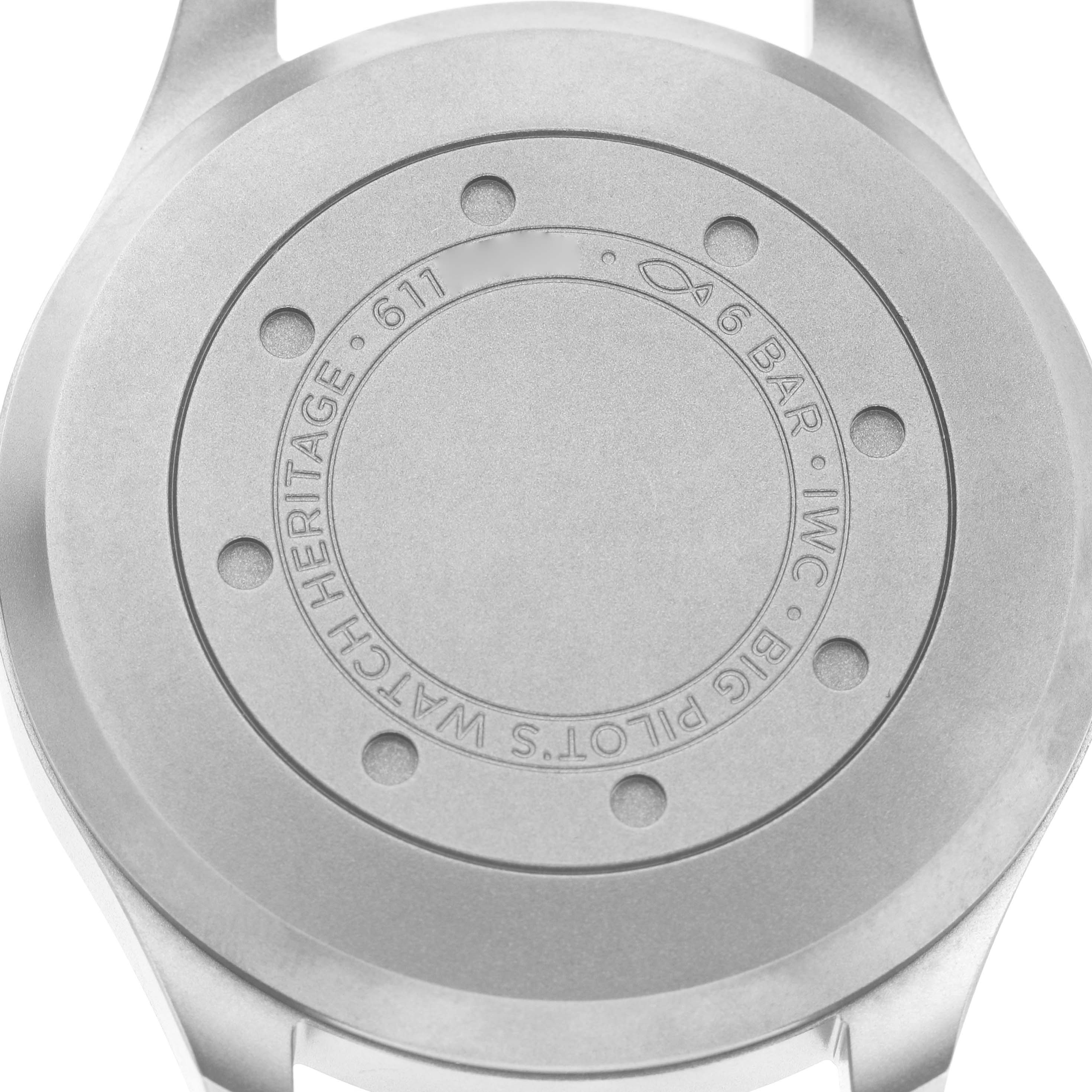 The image shows the back case of the IWC Pilot IW510301 Men's Titanium Black Dial model watch, featuring engraved details.